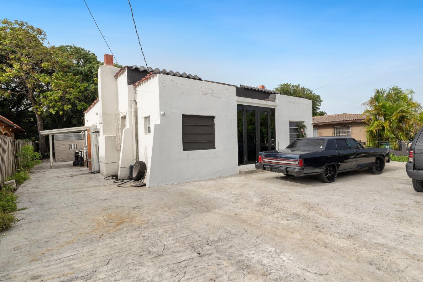 Excellent opportunity in the heart of Miami! Situated on one of the largest lots in the area, this expansive 7 bedroom, 4 bathroom property presents exceptional potential for homeowners, investors, and developers alike. Zoned for duplex use, the property provides a rare opportunity for expansion, redevelopment, multigenerational living, or income producing possibilities.
The roof was replaced in 2022, and with no HOA, you'll enjoy added flexibility and freedom to bring your vision to life. Whether you're looking to renovate, customize, or maximize the property's development potential, the possibilities are endless.
Ideally located within walking distance of LoanDepot Park and just minutes from Miami International Airport, Brickell, Downtown Miami, Coral Gables, and Miami's world famous beaches, this property is positioned in one of the city's most desirable areas with ongoing development and investment nearby.
To help showcase the home's full potential, the bedrooms, bathrooms, living spaces, and exterior areas featured in the photos have been virtually staged. These images are intended to inspire buyers and illustrate the beauty and possibilities that can be achieved through renovation and thoughtful design. This is a rare chance to secure a property with exceptional location, flexibility, and future potential.