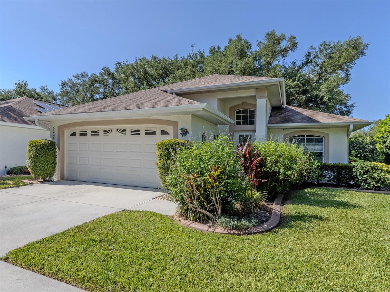 Welcome to this beautifully updated 3-bedroom, 2-bath home offering maintenance-free living in an intimate community of just 27 homes. From the moment you step inside, you'll appreciate the light, bright open floor plan featuring brand-new luxury vinyl plank flooring throughout, fresh interior paint, and a stunning remodeled kitchen.
The kitchen is sure to impress with new white shaker cabinetry, gorgeous quartz countertops, a classic subway tile backsplash, and brand-new refrigerator and range. A sunny breakfast nook provides the perfect spot to enjoy your morning coffee, while the breakfast bar overlooks the dining and living areas, making entertaining effortless. A spacious pantry offers additional storage.
The living room opens through sliding glass doors to the screened lanai, where you'll enjoy peaceful pond views, abundant birdlife, and exceptional privacy. The spacious primary suite also features private lanai access, a walk-in closet, and an updated ensuite bath with a double quartz vanity and walk-in shower. Two additional bedrooms provide comfortable accommodations for family or guests, and the guest bath has been refreshed with a new vanity, new luxury vinyl floors and fresh paint.
Additional features include an interior laundry room with extra storage space and a two-car garage.
Residents enjoy a community pool and the ease of maintenance-free living. Ideally located just minutes from Siesta Beach, as well as exceptional shopping, dining, parks, and everyday conveniences, this move-in-ready home offers the perfect combination of style, comfort, and location.
A beautifully updated home in a peaceful setting—ready for you to move in and enjoy!