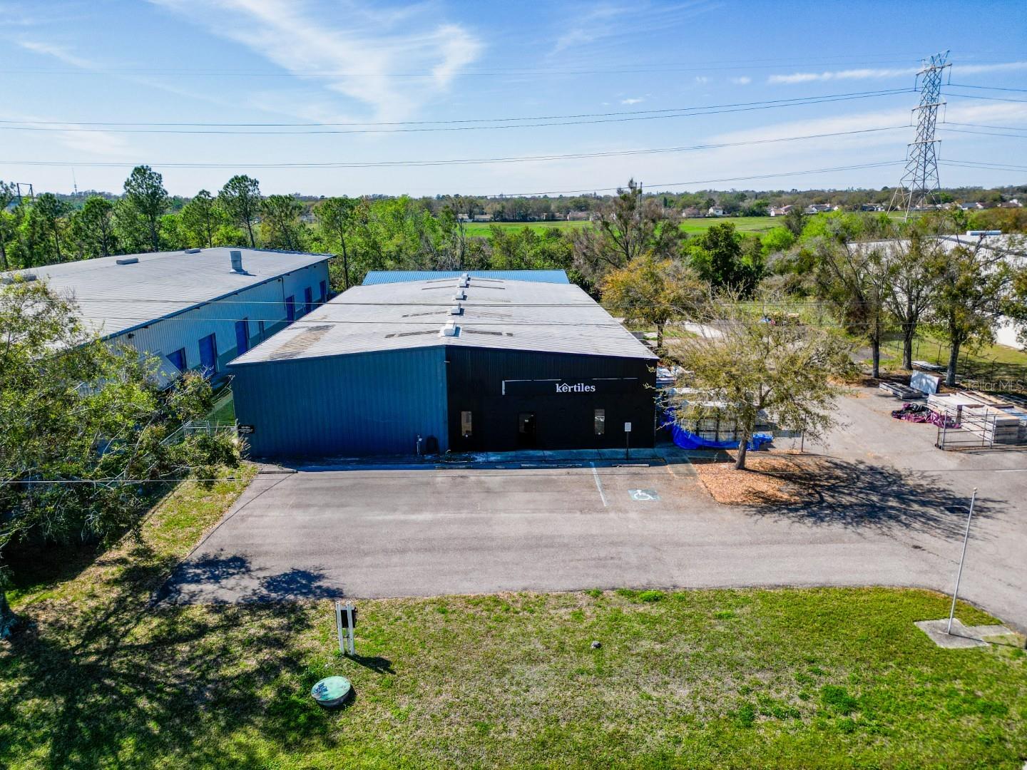 FOR SALE: PRIME INDUSTRIAL FLEX SPACE ? 7702 INDUSTRIAL LANE, TEMPLE TERRACE

Discover an exceptional industrial opportunity in the heart of the thriving Temple Terrace industrial corridor. Located just off Highway 301, 7702 Industrial Lane offers a versatile, high-quality industrial property perfectly suited for investors, distributors, and businesses seeking to expand their operations. This impressive property features 10,551 square feet of industrial flex space spread across two buildings on a 1.4-acre lot. One of the buildings includes a showroom, making it an ideal choice for businesses requiring a combination of warehouse, office, and retail display capabilities.

Positioned for maximum logistical efficiency, this property is perfectly connected to major transportation hubs. It is only 3 miles from I-75, providing quick access to key north-south distribution routes, and just 5 miles from I-4, the vital east-west corridor that connects Tampa to Orlando. The Port of Tampa Bay is 12 miles away, catering to import/export needs, while Tampa Executive Airport is a short 6-mile drive, offering convenience for both freight and business travel. Impressively, the property is located a mere 1 mile from Amazon?s Distribution Center, placing it at the epicenter of a high-demand logistics hub.

Built to last, the structures boast durable metal construction with concrete flooring and are zoned IPD-1 (Light Industrial), allowing for a variety of commercial and industrial applications. In addition, the property is situated in Flood Zone X, ensuring minimal risk and long-term security for your investment.

7702 Industrial Lane is a move-in ready asset that promises strong growth potential in an area where industrial property values are on the rise. Whether you're an owner-user or an investor, this property is a smart, strategic investment that offers the flexibility and connectivity needed for immediate operational success. Contact us today to schedule a tour or to learn more about this prime industrial opportunity.