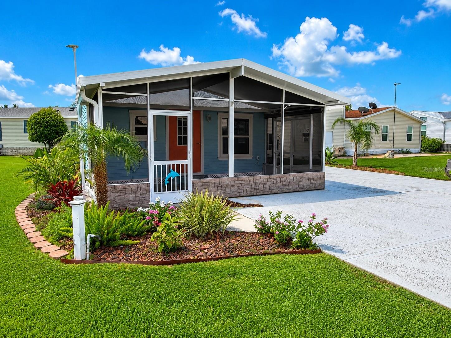 Welcome to the ultimate retreat for Class A motorhome enthusiasts in Phase 5 of Mount Olive Shores. This beautifully landscaped, resort-style lot is thoughtfully designed with a generous concrete slab capable of accommodating any size Class A motorhome. Full public utility hookups with 200 AMP service ensure seamless functionality and convenience. A spacious, air-conditioned casita enhances the property, featuring a full bathroom, washer and dryer, and a comfortable living area. An extra-large attached screened porch extends your living space outdoors, creating the perfect setting to unwind after a day of travel or adventure. With ample room remaining on the lot, there is outstanding potential to add a manufactured home and RV port, allowing you to tailor the property to your specific lifestyle and long-term plans. The HOA provides exceptional value, covering trash service, basic lawn care, maintenance of common areas, and upkeep of the community’s gated entrances and fencing. Residents also enjoy access to a brand-new 5,000-square-foot heated and cooled Community Center designed to elevate the Mount Olive Shores experience. Amenities include a full kitchen, regulation-size pool and shuffleboard tables, dart board, arcade games, a dedicated card room, library, vending area, and a covered BBQ lanai ideal for social gatherings. A vibrant calendar of seasonal events — including Bingo, karaoke nights, potluck dinners, holiday celebrations, and numerous social activities — fosters a dynamic and engaging community atmosphere. Located just minutes from I-4, Mount Olive Shores provides convenient access to shopping, major medical facilities, and both Tampa and Orlando International Airports, with Central Florida attractions less than an hour away. As a secure, gated, deed-restricted community exclusively for Class A motorhomes, ownership or lease of a Class A motorhome is required the first year of residency to preserve the integrity of this distinctive lifestyle. This is more than a lot — it’s an opportunity to secure your place in one of Central Florida’s premier Class A motorcoach communities.