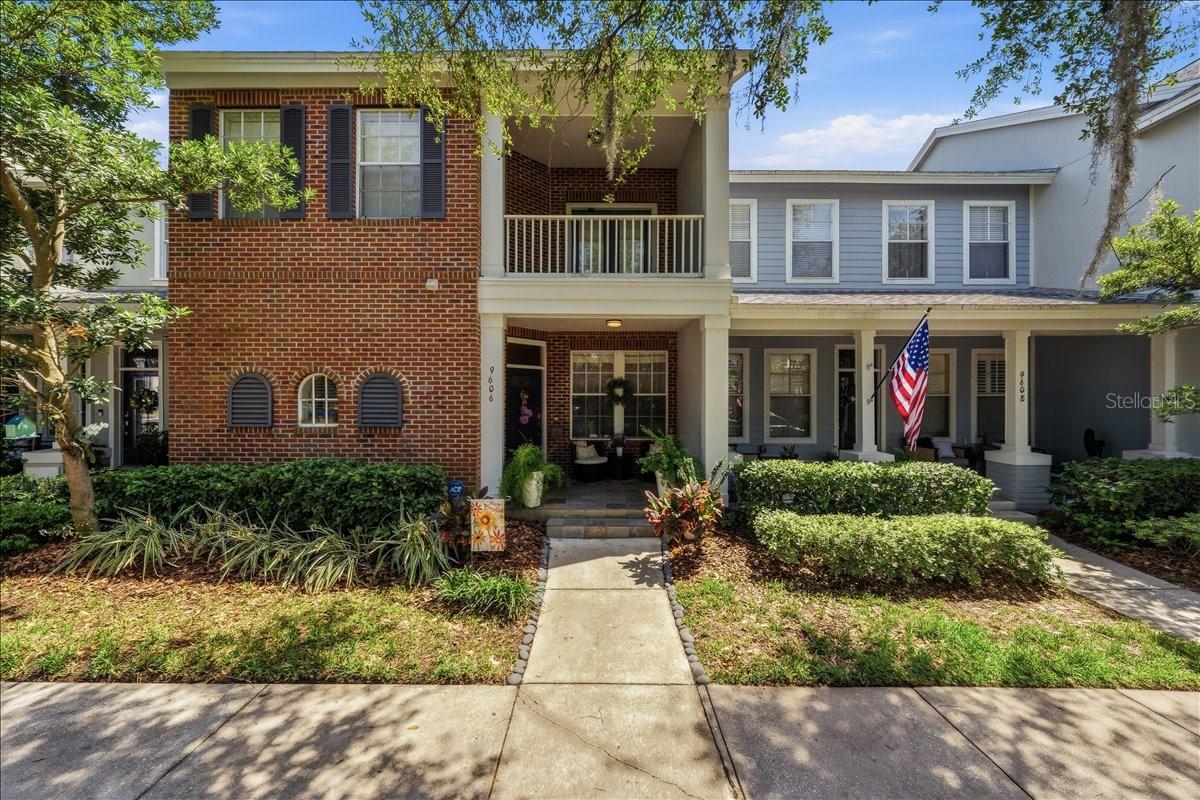 Nestled in the heart of West Park Village, this timeless brick townhome is located in one of the BEST LOCATIONS in Westchase - restaurants, shops, playgrounds & parks, tennis & community pool less than one block away! Featuring 3 bedrooms + Loft (could become a 4th bedroom) 2.5 baths + an enclosed courtyard/backyard + a detached 2 car garage. A formal living room and dining room with wood floors welcomes you home. The kitchen has granite counters, wood cabinetry, a gas range, and breakfast bar that opens into a spacious dinette and family room.  The downstairs primary suite offers a double tray ceiling, wood floors, and a spacious walk-in closet and primary bath highlights a separate shower with garden tub, and a double Vanity. Enjoy the ease of MAINTENANCE FREE LIVING. The monthly HOA fees include access to the Community Pools, Tennis Courts, Basketball Courts, Play Areas, Roof Replacement, Exterior Paint, Lawn & Irrigation Maintenance. NEW AC System 2025. Westchase was just named the best suburb in Florida by Niche. com. Enjoy the lifestyle this award-winning community offers including golf, parks, playgrounds, golf, 2 community pools, tennis courts, & A-rated schools. 2 miles to the Veterans Expressway, 1 mile to Costco, 3 miles to Citrus Park Mall, 8 miles to the Tampa Airport and Westshore Plaza, 14 miles to downtown Tampa and more!