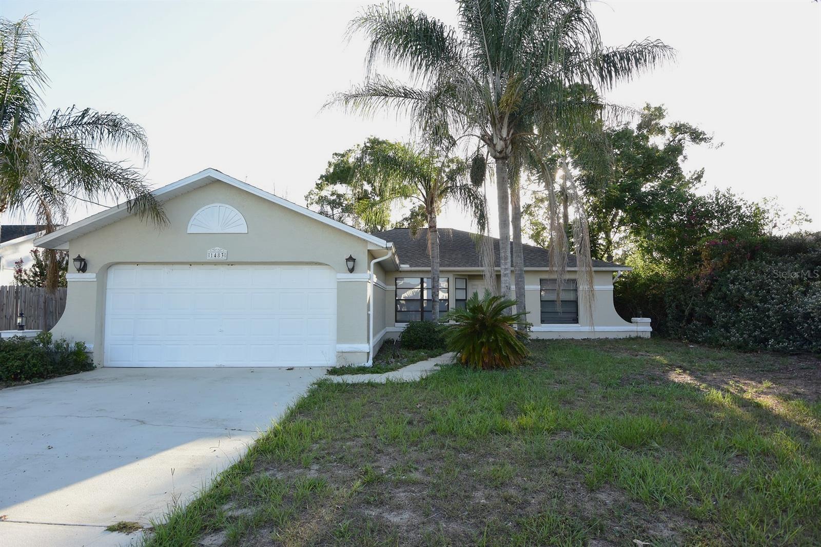 Welcome home to this beautifully updated 3-bedroom, 2-bath, 2-car garage home located in the heart of Spring Hill, Florida. From the moment you step inside, you'll appreciate the soaring cathedral ceilings, open floor plan, and spacious great room that create a bright and inviting atmosphere perfect for everyday living and entertaining. The updated kitchen features gorgeous granite countertops, stainless steel appliances, and plenty of cabinet space. The split-bedroom floor plan includes a large primary suite and updated bathrooms showcasing attractive tile work and granite countertops. Additional features include an inside utility room, a relaxing sunroom, and a screened porch overlooking a spacious, pool-sized backyard. The fully fenced yard offers plenty of room for pets, play, or future outdoor projects and includes a large utility shed for additional storage. Conveniently located just minutes from the Suncoast Parkway (SR 589), this home offers an easy commute north to Crystal River or south to Tampa's employment centers, professional sporting events, world-class dining, entertainment, and Tampa International Airport. This is a fantastic opportunity to own a move-in-ready home in one of Spring Hill's most desirable locations. Schedule your showing today before it's gone!