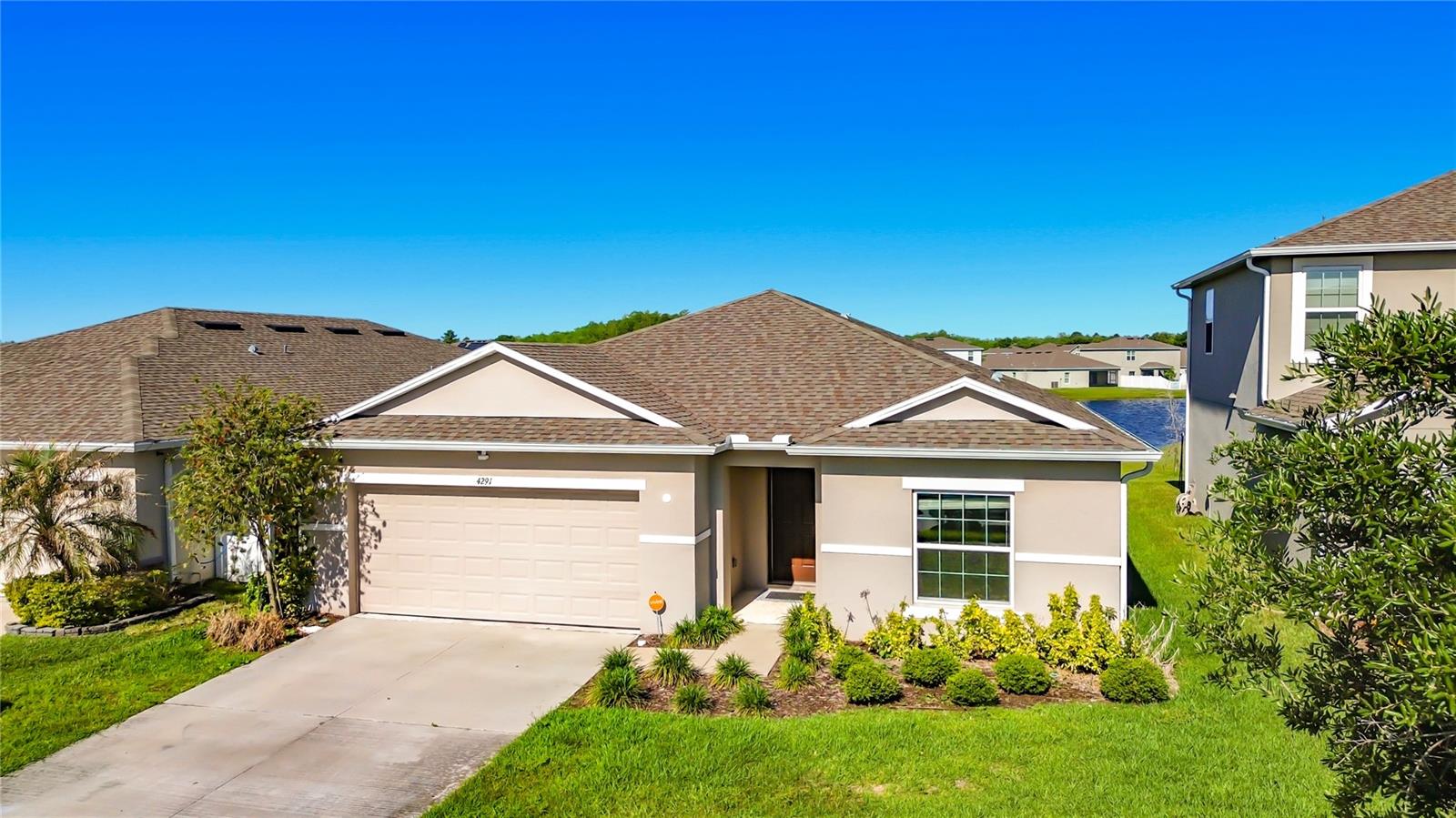 Welcome to this beautifully maintained 4-bedroom, 2-bathroom home with a 2-car garage. This home features a modern open-concept floor plan with spacious living and dining areas, a well-appointed kitchen with stainless steel appliances, ample cabinetry, and a large center island. The split-bedroom layout offers added privacy, while the primary suite includes a walk-in closet and an en-suite bathroom with dual sinks and a walk-in shower. The backyard overlooks a peaceful pond, providing scenic WATER VIEWS and a tranquil outdoor setting.

Located in the Southern Pines community, residents enjoy access to community amenities including a SWIMMING POOL, playground, and common green spaces for outdoor enjoyment and recreation.

Conveniently situated near US-192, Narcoossee Road, and Florida's Turnpike, this home offers excellent connectivity throughout the area. Approximate driving times include 10 minutes to Downtown St. Cloud and St. Cloud Lakefront, 15 minutes to major shopping, dining, and everyday conveniences, 20 minutes to Lake Nona Medical City, and approximately 20–25 minutes to Orlando International Airport.

Schedule your private showing today.