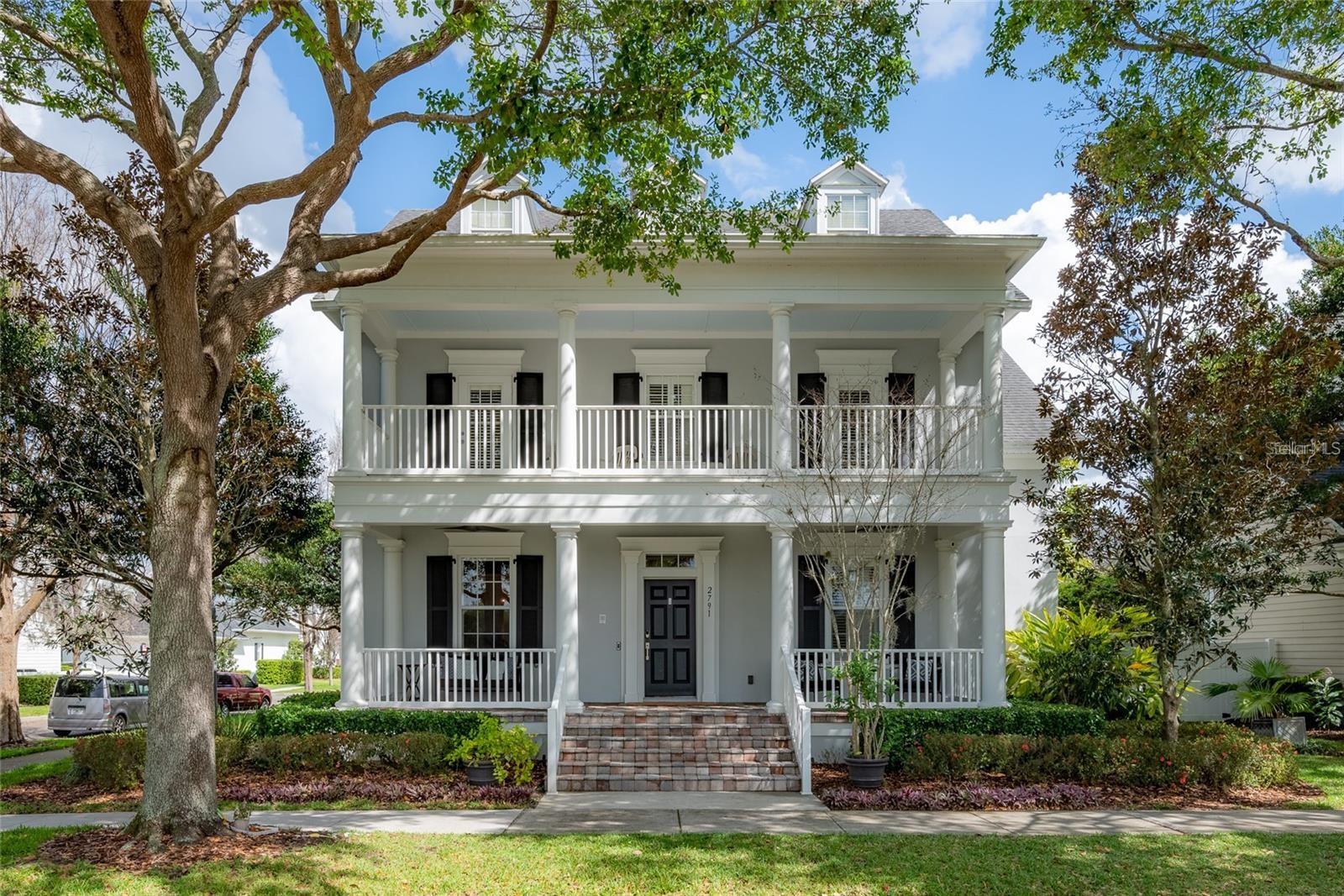 Experience elevated living in this exceptional residence, nestled on a tree-canopied street in one of Orlando's most coveted communities. Perfectly positioned with serene water views from sunrise reflections to golden evening skies. This beautifully appointed home blends timeless elegance with modern sophistication, offering a refined lifestyle defined by comfort, style and thoughtful design. From the moment you arrive, you are greeted by charming curb appeal and lush landscaping that set the tone for what lies within. Inside, discover light-filled interiors, soaring ceilings and an open, flowing floor plan designed for both everyday living and effortless entertaining. Designer finishes, custom millwork and upscale fixtures elevate every space. The gourmet kitchen serves as the heart of the home, featuring premium cabinetry and expansive countertops perfect for hosting intimate dinners or lively gatherings. The adjoining living and dining areas create a seamless connection, enhanced by elegant details and a warm, inviting ambiance. Retreat to the luxurious first-floor primary suite, a private sanctuary complete with a spa-inspired bath, fireplace and generous walk-in closets. Additional upstairs bedrooms and a large bonus room offer comfort and versatility, ideal for family or guests. Outdoor living is equally impressive with beautifully curated spaces designed for relaxation and entertaining. Located in Baldwin Park, this home offers convenient access to scenic parks, top-rated schools, dining, boutique shopping and vibrant community amenities while conveniently located minutes from downtown Orlando and Winter Park.