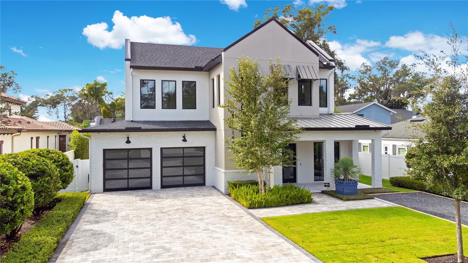 One or more photo(s) has been virtually staged. Step into the lap of modern luxury with this new gem in Winter Park, FL! This 5-bedroom beauty is more than just a home; it’s a lifestyle upgrade. The open, sunlit spaces effortlessly blend modern design with everyday comfort. The kitchen? It’s a chef’s dream with top-tier appliances. Venture outside and you'll find a serene pool surrounded by lush greenery - a private escape in the midst of suburban life. It’s not just a house; it’s your personal retreat. And let’s talk location – Winter Park charm meets convenience. Top schools, cultural hotspots, and a vibrant community are practically neighbors. Elevate your everyday in this modern masterpiece that’s not just a home; it’s a statement.