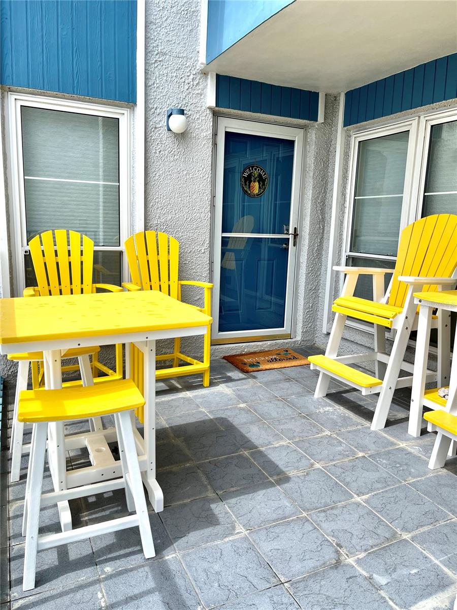 RARELY AVAILABLE WATERFRONT TOWN HOME WITH DEEDED BOAT SLIP #57 directly behind unit. Hi and Dry, no need to worry about flooding here. Keep an eye on your boat from the privacy of your patio, living room and both bedrooms. Enjoy the ultimate waterfront lifestyle in this Fully Furnished completely remodeled townhome at Madeira Beach Yacht Club, offering the perfect blend of comfort, style and income potential. Conveniently located about a block from the sugar sands of Madeira Beach.  Upon entering you will discover a bright and inviting tastefully decorated living space with modern finishes including newer LVP flooring, modern lighted remote ceiling fan(which you will find 3 more identical fans throughout unit) a Classic Flame decorative fireplace to set the mood or offer heat on chilly winter nights and wine fridge. Continue to the thoroughly modern Kitchen and dining room where you will find  matching hutches filled with decorative dishes and while dining you can enjoy beautiful water views while looking out the floor to ceiling windows. Also on this level you will find laundry room, 1/2 bath and utility room. Upstairs you will find an oversized master suite with LVP flooring and large walk in closet, guest bedroom also has LVP flooring double closet and both bedrooms have water views. Remodeled bathroom has oversized walk in Shower. NEW A/C 2025. MBYC allows 7 day  rentals allowing you to maximize income while not occupying your condo.  This unit currently has $18,000 in confirmed bookings.  MBYC a gated community is known for its resort style amenities including 2 heated pools, indoor hot tub, clubhouse, fitness center, billiard room and 4 fishing piers. Owners her can enjoy the walkable location direct across from ROC park which provides Rec center, tennis and pickleball courts, playground, splash pad, basketball courts and baseball field and is within blocks of several dining options, boutiques, grocery and drug stores, library, post office. World famous Johns pass is appx 1 mile easily walkable or just hop on the trolley. Come discover this high demand Gulf Coast destination where you will find this condo with boat slip delivers ideal location and relaxed coastal living waiting for you.