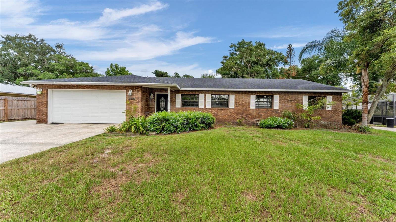 Imagine ending your day with plenty of room to unwind, entertain, and enjoy life without feeling crowded. Nestled on a generous .28-acre homesite in desirable South Lakeland, this spacious 4-bedroom, 2-bath home provides the comfort, flexibility, and outdoor space that's becoming increasingly difficult to find.

From the moment you walk inside, you'll appreciate a layout that simply makes sense. The kitchen is truly the heart of the home, providing granite countertops, abundant wood cabinetry, a center island, and plenty of space to cook, gather, and stay connected with family and friends. It flows effortlessly into the dining area and spacious living room, creating the perfect setting for everything from quiet evenings to holiday celebrations.

 The primary suite gives a comfortable retreat after a long day, while the three additional bedrooms give you the flexibility to accommodate family, guests, a home office, workout room, or whatever fits your lifestyle.

One of the biggest highlights is the backyard. Sitting on nearly a third of an acre, the fully fenced outdoor space gives you the freedom to make it your own. Whether you envision weekend barbecues, a play area, a garden, or even adding a future pool, there's plenty of room to bring those ideas to life. The screened lanai is the perfect place to enjoy your morning coffee or unwind in the evenings while overlooking your private backyard.

Living in South Lakeland means you're never far from where you need to be. With easy access to the Polk Parkway, commuting is convenient, while shopping, dining, parks, healthcare, and the charm of Downtown Lakeland are all just minutes away.

If you've been searching for a home with generous living space, a functional floor plan, a large fenced yard, and a location that keeps you close to everything South Lakeland has to provide, this home deserves a spot at the top of your list.