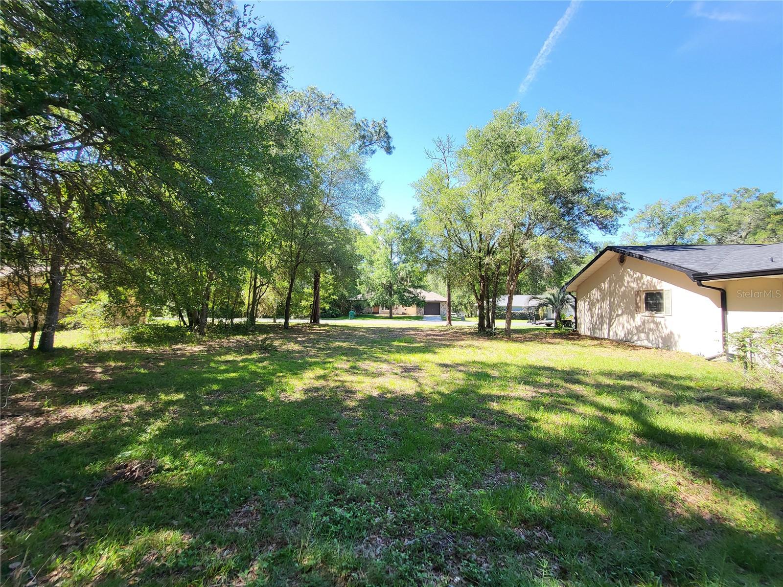What a great location for you new home, just seconds down the road from Holden Park, playground, walking trails, basketball courts, and socker fields. This high and dry lot is mostly cleared but still has a few big trees, and ready for that family or those folks into the outdoor activity. Listing agent is related to seller.