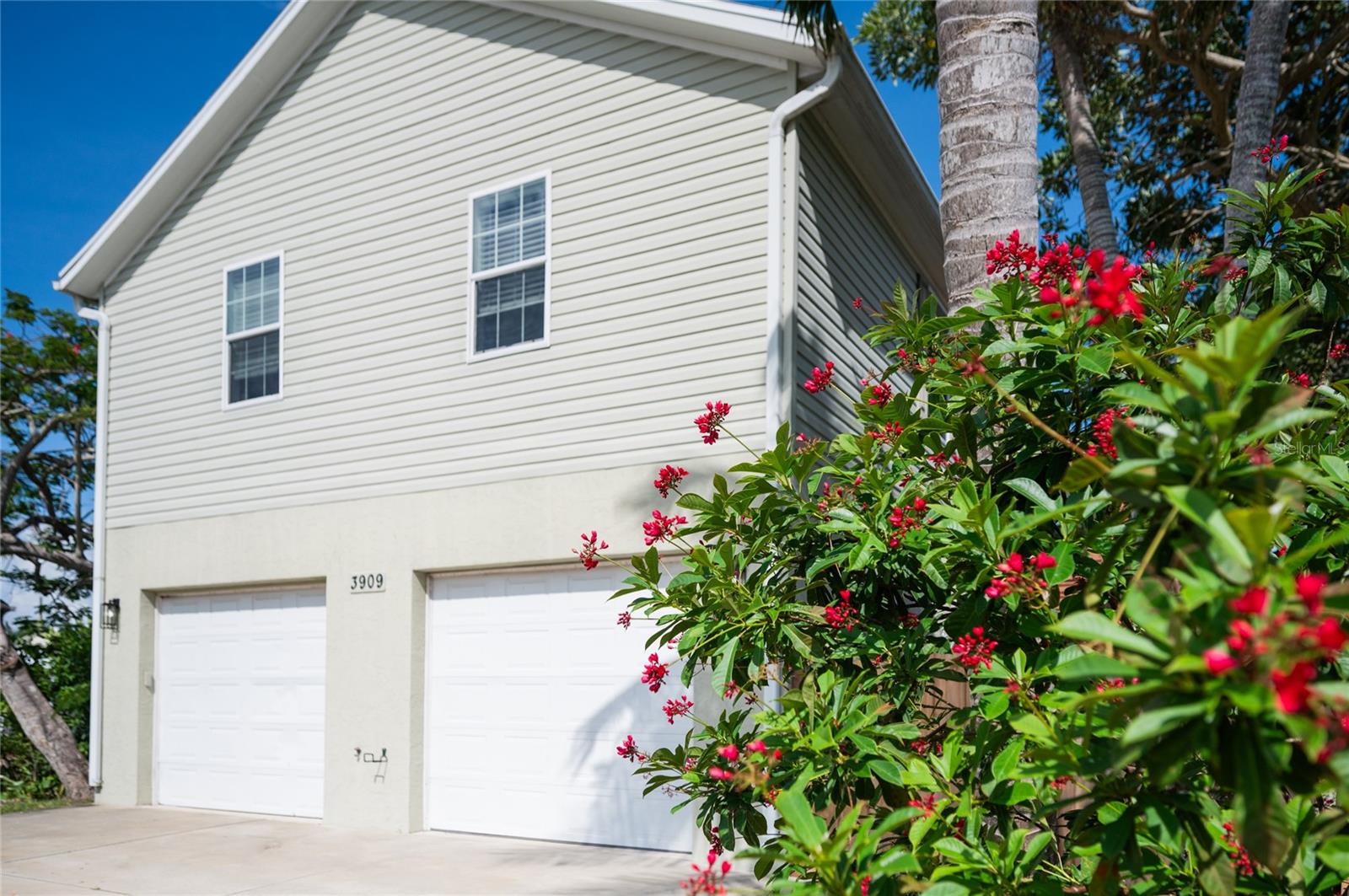 Located in the heart of the historic fishing village of Cortez, this 3-bedroom, 2-bath home offers the perfect blend of Old Florida charm and coastal convenience, just minutes from Anna Maria Island, Gulf beaches, marinas, waterfront dining, and world-class boating and fishing. Inside, you'll find a bright, open floor plan with high ceilings, abundant natural light, and comfortable living spaces that flow seamlessly between the kitchen, dining, and living areas. Recent updates include a new fence (2025), new A/C (2025), new water heater (2025), and a roof replaced in 2018, providing added peace of mind for years to come. The oversized garage and workshop area is a standout feature, offering ample room for boats, golf carts, kayaks, paddleboards, fishing gear, vehicles, tools, and storage. Whether you're looking for a primary residence, seasonal getaway, or investment opportunity, this property offers easy access to Anna Maria Island, boating, fishing, and the best of Florida's Gulf Coast lifestyle.