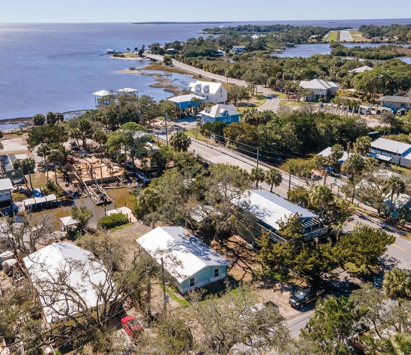This Cedar Key property presents a rare opportunity for buyers looking to rebuild or reimagine a coastal home in one of Florida’s most unique waterfront communities. Previously impacted by storm damage, the property is now positioned for potential repair or reconstruction under current FEMA and local guidelines. Based on guidance from local officials, rebuilding may be possible depending on the scope of work and overall project cost relative to the structure’s pre-storm value. This creates a unique opportunity for buyers to design and execute a project that fits within those parameters—whether restoring the existing footprint or creating a thoughtfully updated coastal retreat. The value calculation is based on the structure only (excluding land), giving buyers a clear framework to explore renovation or rebuilding options. Due to FEMA regulations and the 50% rule, buyers are encouraged to work with the City of Cedar Key, contractors, and design professionals to fully understand allowable improvements, elevation requirements, and permitting options. If you’ve been looking for a project with flexibility, upside, and the ability to create something truly your own, this is an opportunity worth exploring.