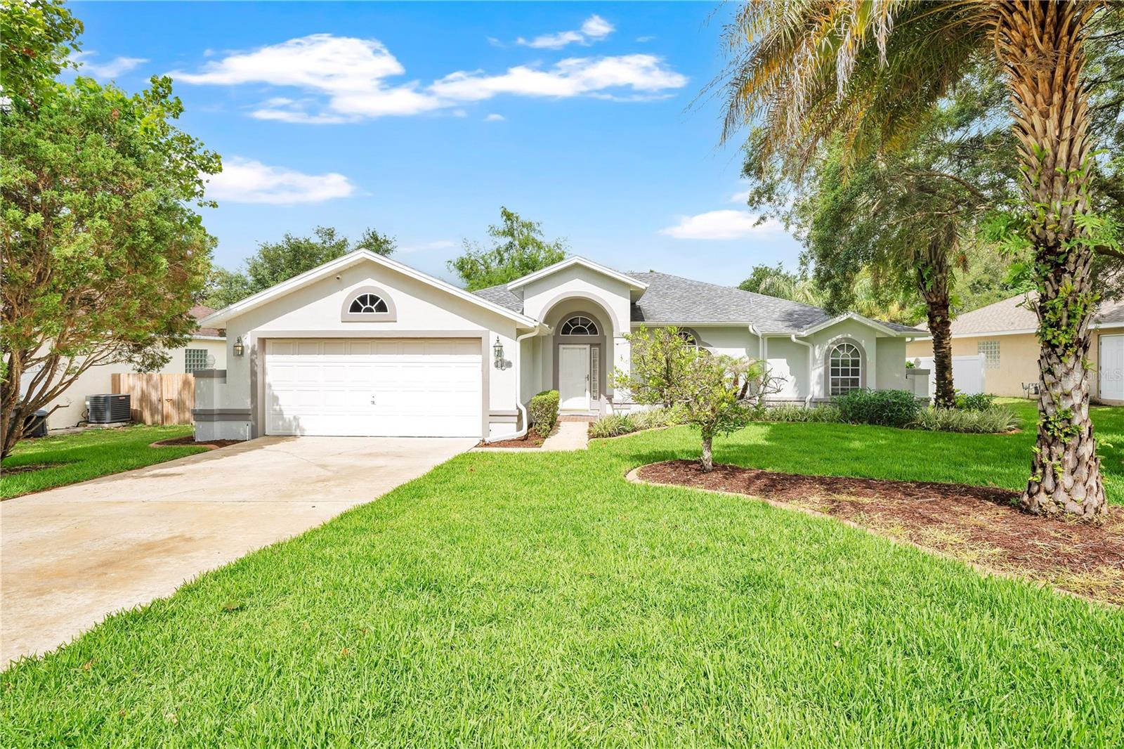 NEWELY RENOVATED HOME WITH THE FOLLOWING UPGRADES: LUXUREY VINYL FLOORING 2026, INTERIOR PAINT 2026, UPDATED KITCHEN CABINETS 2026, COURT COUNTERTOPS 2026, BATHROOM VANITIES 2026, CEILING FANS 2026, GERNERAC, HOT WATER HEATER 2021, ROOF 2016, STOVE 2026, NEW PORCH LIGHTS, GARAGE and PORCH have HYPOXY FLOORING, FENCING IN THE YARD, FRESH SWARD, LOW HOA FEES!!