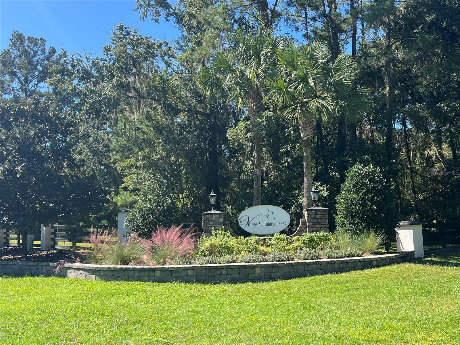 Welcome to The Village at Hidden Lakes – A Tranquil Equestrian Community.  Discover the perfect blend of privacy and convenience with this wooded 3.47-acre lot, nestled within this prestigious, deed-restricted community. This beautiful parcel is a blank canvas for your dream mini-farm or private estate, surrounded by nature and like-minded neighbors who appreciate the peaceful lifestyle.  Located in NW Marion County, the community features s stunning gated entrance. miles of scenic riding trails, private, well-maintained roads, a quiet, rural atmosphere ideal for horse enthusiasts and easy access to utilities.  Enjoy the best of both worlds—seclusion and convenience. You're just a short drive to Ocala, Williston, Gainesville, and only 20 minutes from the World Equestrian Center.  Don’t miss this opportunity to build your dream in one of Marion County’s most desirable equestrian communities.