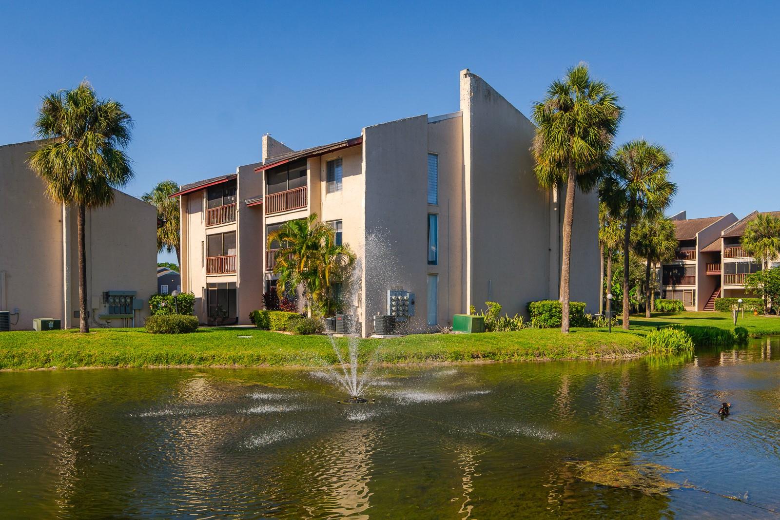 Enjoy peaceful pond and fountain views every day from this charming 1-bedroom, 1-bathroom condo located on the second floor in the gated community of Whisper Lake! Offering one of the best views in the neighborhood, this home overlooks a tranquil pond with a fountain that can be enjoyed from the living room, bedroom, and private screened-in porch—the perfect place to relax and unwind. Inside, the bright and open layout is designed to maximize the serene water views and natural light throughout the home. Recent updates provide added peace of mind, including a BRAND-NEW AC unit, a newly installed entry door, and brand-new roofs completed in 2023. New gutters have also been approved for installation on the building. Whisper Lake offers resort-style amenities including three community pools, walking trails, lush landscaping, and a clubhouse. Residents also enjoy gated entry, three laundry facilities, two free parking spaces, an on-site community manager, and maintenance staff. HOA fees include water and garbage removal for added convenience. Ideally located in the heart of Carrollwood, you’re just minutes from Dale Mabry Highway, International Plaza and Bay Street, Downtown Tampa, Tampa International Airport, Raymond James Stadium, shopping, dining, and entertainment. Whether you’re a first-time homebuyer, seasonal resident, or investor searching for a property in a high-demand Tampa location, this condo is a fantastic opportunity!