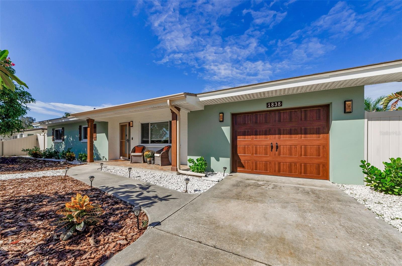 Welcome to this charming 3 Bedroom, 2 Bath, oversized 1 Car Garage home located in Clearwater. This beautifully well-maintained, single-story home offers a spacious layout, ideal for comfortable living and entertaining! Inside, you'll find a warm and inviting living room, dining room, and a stunning kitchen complete with rich wood cabinetry and granite countertops. This home has been lovingly cared for and offers a wonderful flow that makes it both comfortable and functional. A screened in lanai provides the perfect spot to relax or entertain, while the fenced-in yard offers privacy and plenty of space for outdoor enjoyment. With its charming curb appeal and thoughtful details throughout, this home is move-in ready and waiting for its next owner!