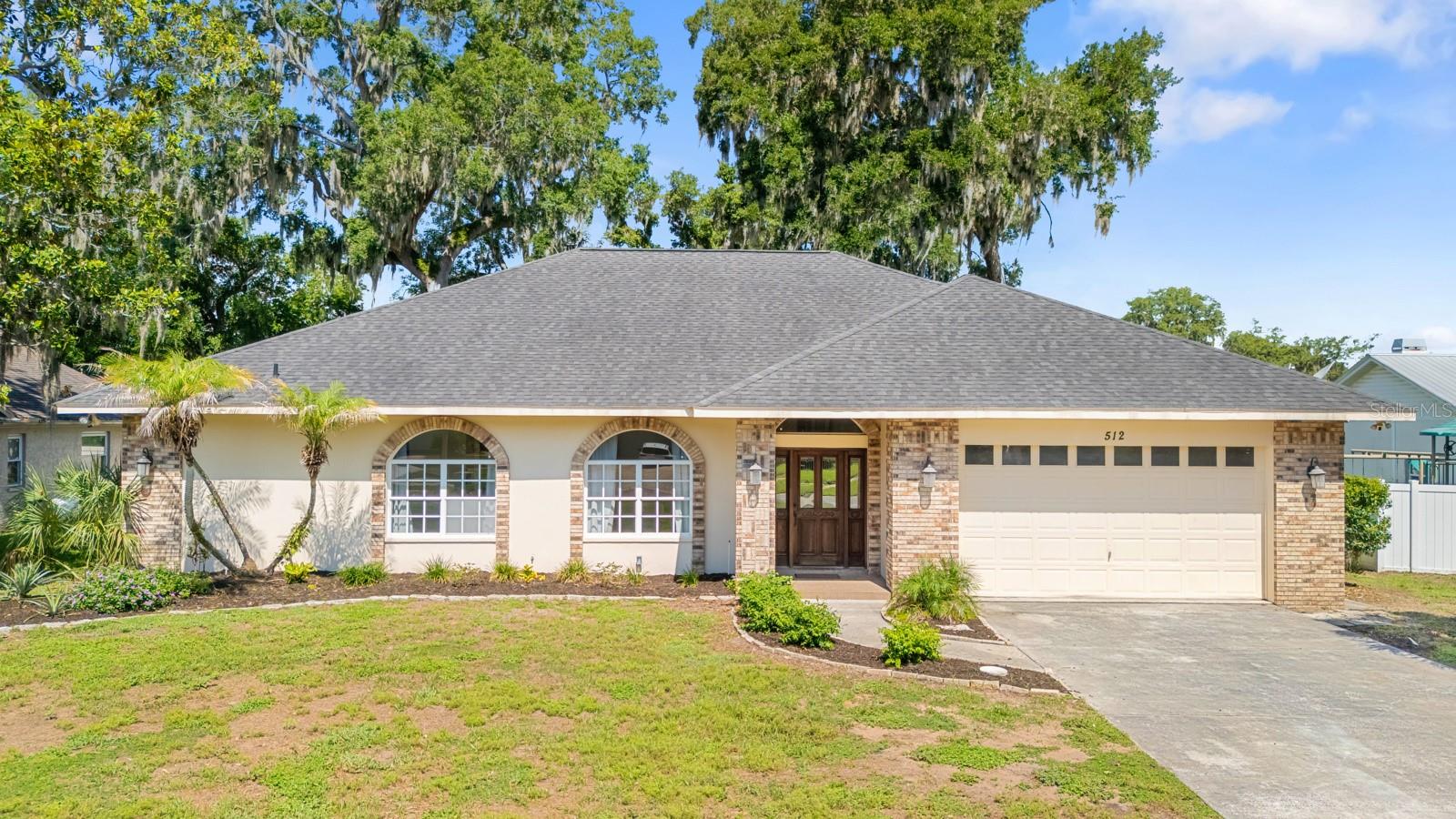 Welcome to your own private retreat in the highly sought-after Hickory Hill community! Situated on a spacious .35-acre lot, this beautifully updated 5-bedroom, 3-bathroom pool home offers the perfect blend of space, comfort, and flexibility for today’s lifestyle.

From the moment you step inside, you’ll appreciate the fresh, move-in-ready feel created by numerous recent updates and thoughtful improvements throughout. The spacious floor plan features soaring ceilings, formal living and dining areas, and an open-concept design that seamlessly connects the kitchen and family room, making it ideal for both everyday living and entertaining.

The versatile 5-bedroom layout provides endless possibilities for growing families, guests, a home office, fitness room, or multigenerational living. The private primary suite serves as a relaxing retreat, featuring direct pool access, a walk-in closet, dual vanities, and a walk-in shower.

Recent improvements include a new HVAC system (2025), new luxury vinyl flooring throughout (2025), a resurfaced fireplace (2025), a custom bar addition (2025), a new garbage disposal (2025), new kitchen appliances (2026), updated bathroom (2026), new light fixtures (2026), fresh interior paint (2026), full perimeter pet fence (2026), and a recently installed garage door opener, giving buyers peace of mind and allowing them to move right in without the expense of major updates.

Step outside and experience Florida living at its finest. The screened-in pool and expansive pool deck create the perfect setting for weekend barbecues, family gatherings, or simply relaxing in your own backyard oasis. The generous lot provides additional space to enjoy outdoor activities while maintaining privacy.

Additional highlights include a two-car garage, oversized driveway, and one of the property’s most unique advantages—voluntary HOA, offering the freedom and flexibility that is increasingly difficult to find.

With major updates already completed, a rare 5-bedroom floor plan, private pool, stylish interior upgrades, and over one-third of an acre to enjoy, this exceptional home is ready for its next chapter. Schedule your private showing today and discover everything this beautiful property has to offer!