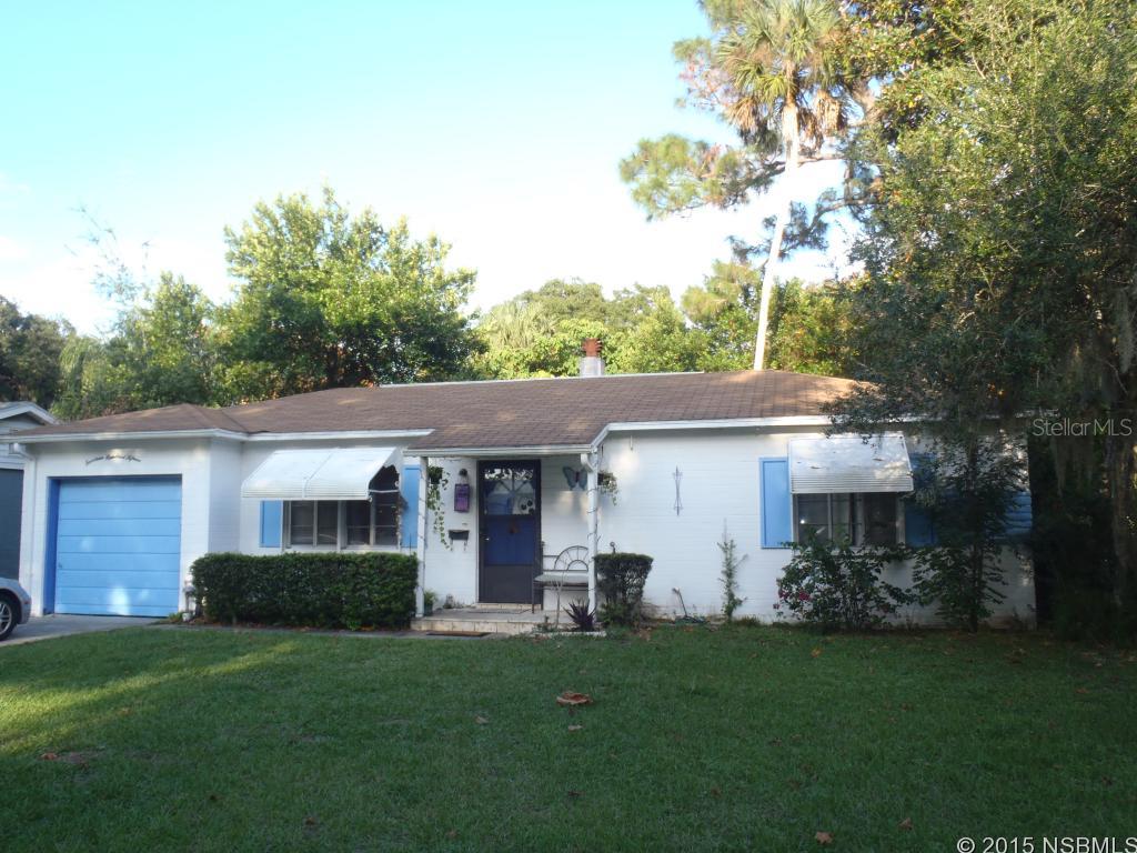 Charming block home in historic neighborhood. Perfect starter or retirement home offering large backyard in quiet established neighborhood. Laminate wood flooring in living/dining area.  Warm neutral colors.  Glass French doors entry into Florida room with wood tongue and groove ceiling. Close to schools and library. Great location between US1 and Intracoastal. ;Water: City