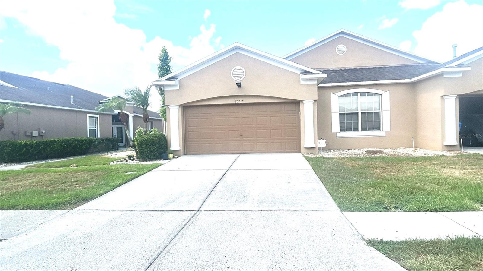 Welcome to this beautifully maintained 4-bedroom, 2-bath villa located in the highly desirable gated community of Lettingwell in Meadow Pointe II. Originally designed as a 3-bedroom home, this residence has been enhanced with a professionally added fourth bedroom, providing the perfect space for a growing family, guests, or a home office. Offering 1,743 square feet of thoughtfully designed living space, the home features an open floor plan with spacious living and dining areas, laminate flooring throughout, and a well-appointed kitchen with granite countertops, stainless steel appliances, a breakfast bar, and a large walk-in pantry.

The spacious primary suite offers a large walk-in closet and an en-suite bath with dual vanities and a walk-in shower. Enjoy a partially fenced backyard, creating the perfect setting for relaxing or entertaining. Additional highlights include plantation shutters, a tankless water heater, an inside laundry room, and a rear-entry two-car garage.

The HOA provides low-maintenance living by covering exterior maintenance, roof replacement, exterior painting, landscaping, and trash service.

Located within the award-winning Meadow Pointe master-planned community, residents enjoy an exceptional lifestyle with on-site schools, scenic parks, nature preserves, tranquil ponds, multiple clubhouses, resort-style swimming pools, fitness centers, tennis and basketball courts, playgrounds, walking trails, and a variety of community activities. Conveniently located near top-rated schools, shopping, dining, hospitals, and major highways, with easy access to Tampa, downtown, and the Gulf Coast beaches.

Move-in ready and loaded with desirable features, this home offers the perfect combination of comfort, convenience, and resort-style living.