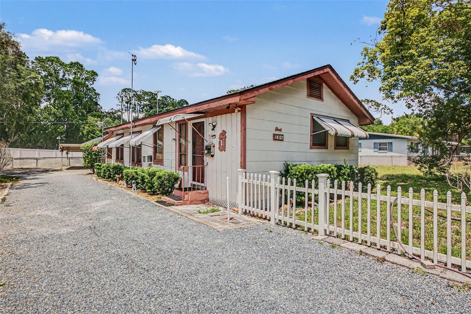 Investor opportunity in a great Lake Mary location! Public records show this home as a 1 bedroom, 1 bath with 855 sq ft, but the property offers much more potential. The existing layout could easily be reimagined as a 2 bedroom, 1 bath, giving buyers the chance to add value and maximize the space. Situated on a nice .25 acre fenced lot, this property also features a large detached workshop with electric and plumbing already in place, creating exciting potential for a studio, guest space, home office, or possible ADU conversion. Buyer to verify all zoning, permitting, and intended use. Bring your vision and creativity. This property is being sold As Is, allowing the next owner to imagine the possibilities and make it their own. Great opportunity for investors, renovators, or buyers looking for a project with upside potential!
