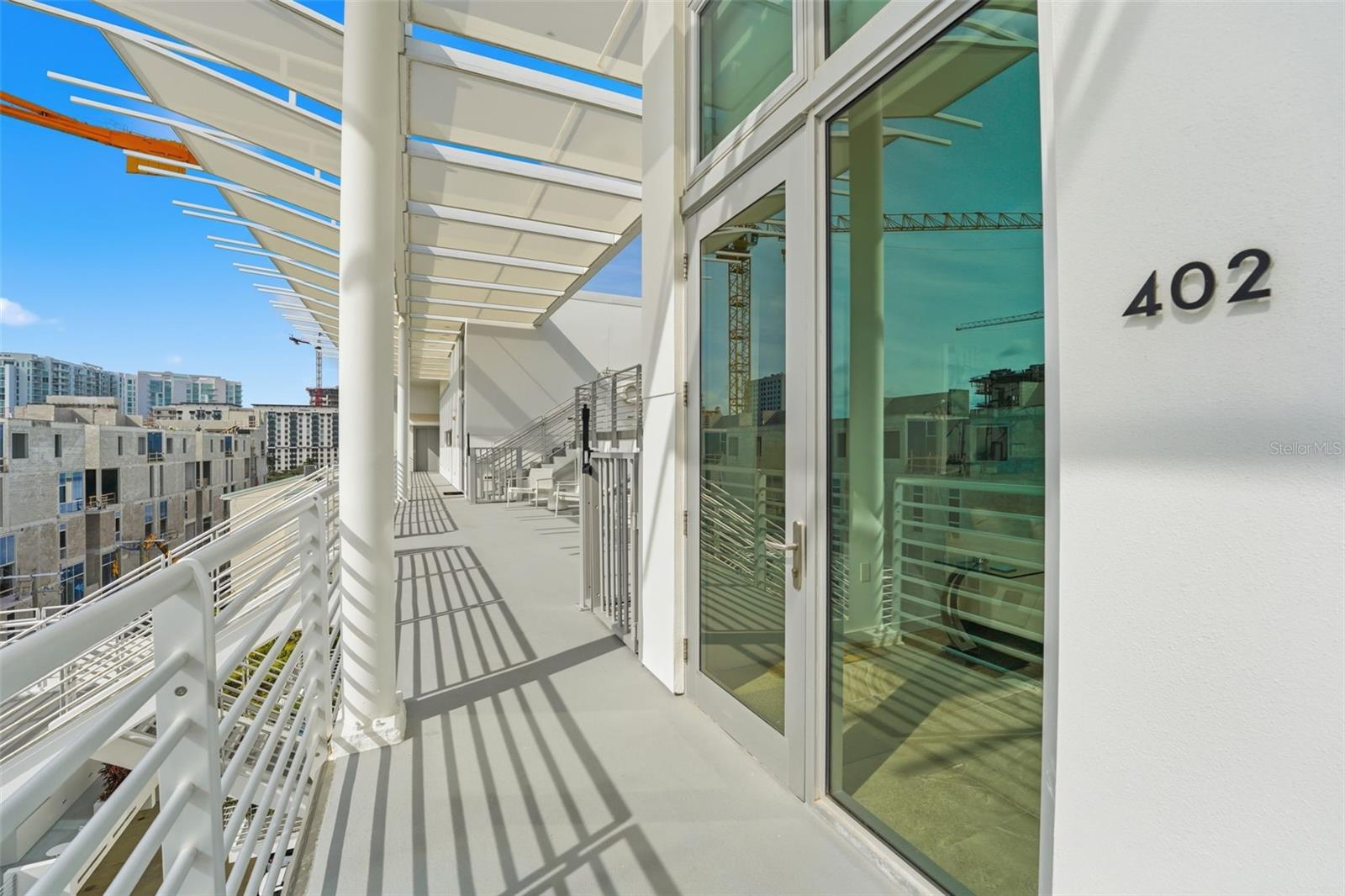 Stunning one bedroom penthouse in the heart of the Rosemary District, one of downtown Sarasota’s most vibrant and sought after neighborhoods, this residence elevates luxury condo living with the ultimate distinction, an exclusive private 1 car garage, an exceptionally rare offering in luxury condo living. Positioned on a private penthouse level with only four residences, this sophisticated urban retreat combines privacy, security, contemporary design, and unmatched walkability.

Filled with natural light, the residence features soaring ceilings, impact rated windows and doors, electric blinds, and refined modern finishes throughout. The open concept layout is complemented by a beautifully appointed kitchen with a premium appliance package, sleek cabinetry, and an oversized single cell sink designed for both style and functionality.

Designed by Halflants + Pichette Studio for Modern Architecture, Risdon on 5th showcases striking contemporary architecture and an elevated downtown Sarasota lifestyle. Step outside your door to enjoy the rooftop pool and observation lounges, offering resort style amenities and an elevated atmosphere perfect for relaxing or entertaining. The gated community provides peace of mind while placing you in the center of downtown Sarasota’s thriving arts and entertainment scene.

Residents enjoy unbeatable walkability to the Sarasota Opera House, theaters, acclaimed dining, rooftop bars, art galleries, boutique shopping, coffee shops, nightlife, and waterfront attractions. The private one car garage is a true rarity for downtown Sarasota penthouse living, adding convenience and long term value rarely found in the Rosemary District.

Ideal as a full time residence, seasonal retreat, or investment opportunity, this exceptional penthouse offers the perfect lock and leave lifestyle in one of Sarasota’s most desirable urban locations.