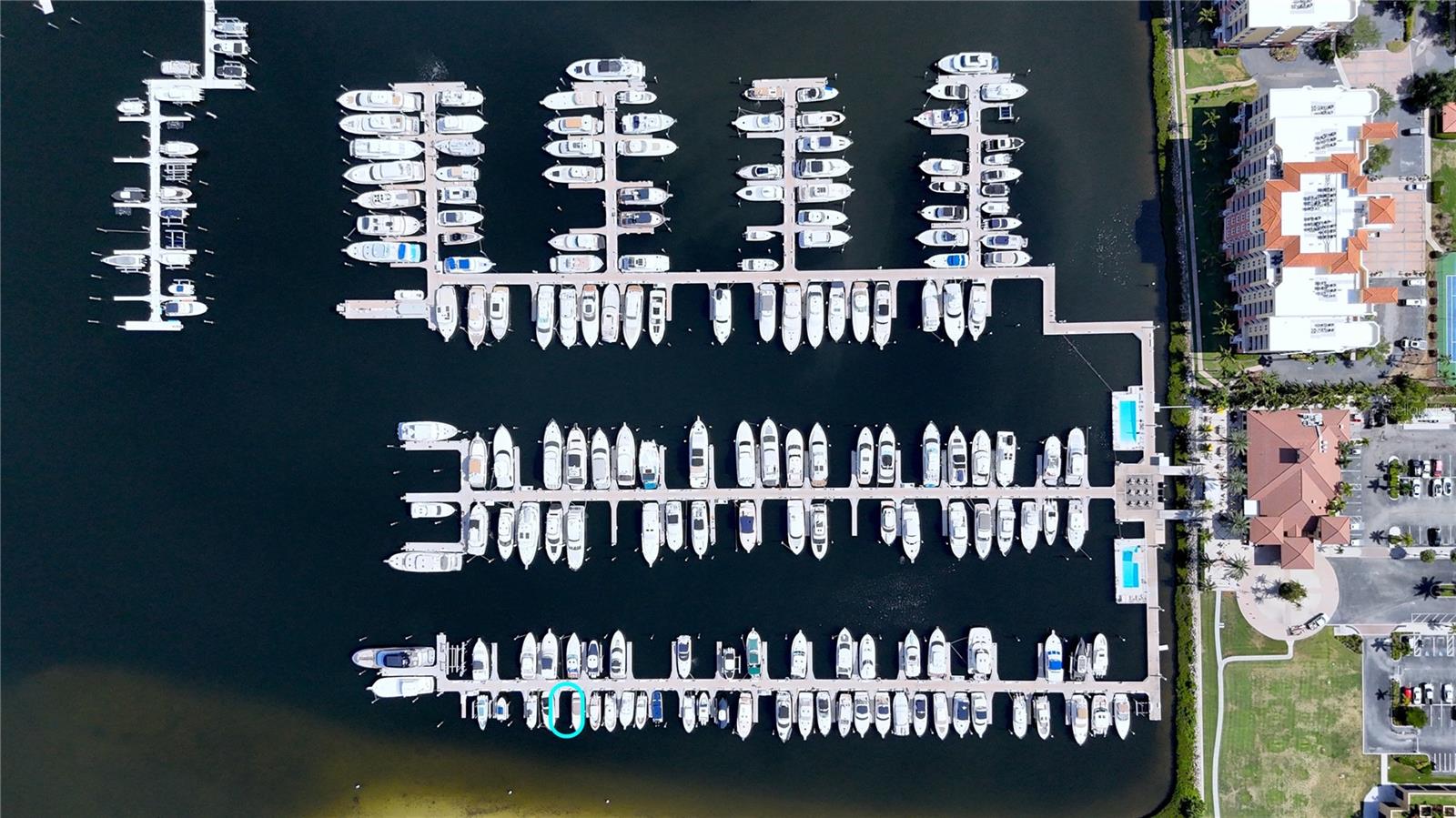 Owner financing available and lift allowed. Boat slip N-30 at Riviera Dunes Marina in Palmetto, Florida offers the opportunity to own a wet slip in one of the areas most protected and desirable marinas. Accommodating vessels up to 35' x 12', this slip provides an ideal home base with convenient access to the Manatee River, Tampa Bay, Anna Maria Island, Longboat Key, and the Gulf of Mexico. Riviera Dunes Marina is known for its protected harbor and, per seller, has never sustained hurricane damage, including during recent storms. Slip owners enjoy outstanding amenities including gated parking, 50-amp electrical service, cable TV, WiFi, water, pump-out service, HD security cameras, laundry facilities, private bathrooms and showers, a pet walking area, two heated floating pools, tiki bar, and the on-site Blu Mangrove Grill restaurant. Purchased slips may be rented and managed by the owner or marina, and you do not need to own a condo at Riviera Dunes to purchase. With owner financing available, this is a compelling opportunity to secure a luxury marina slip on Florida's beautiful Gulf Coast.