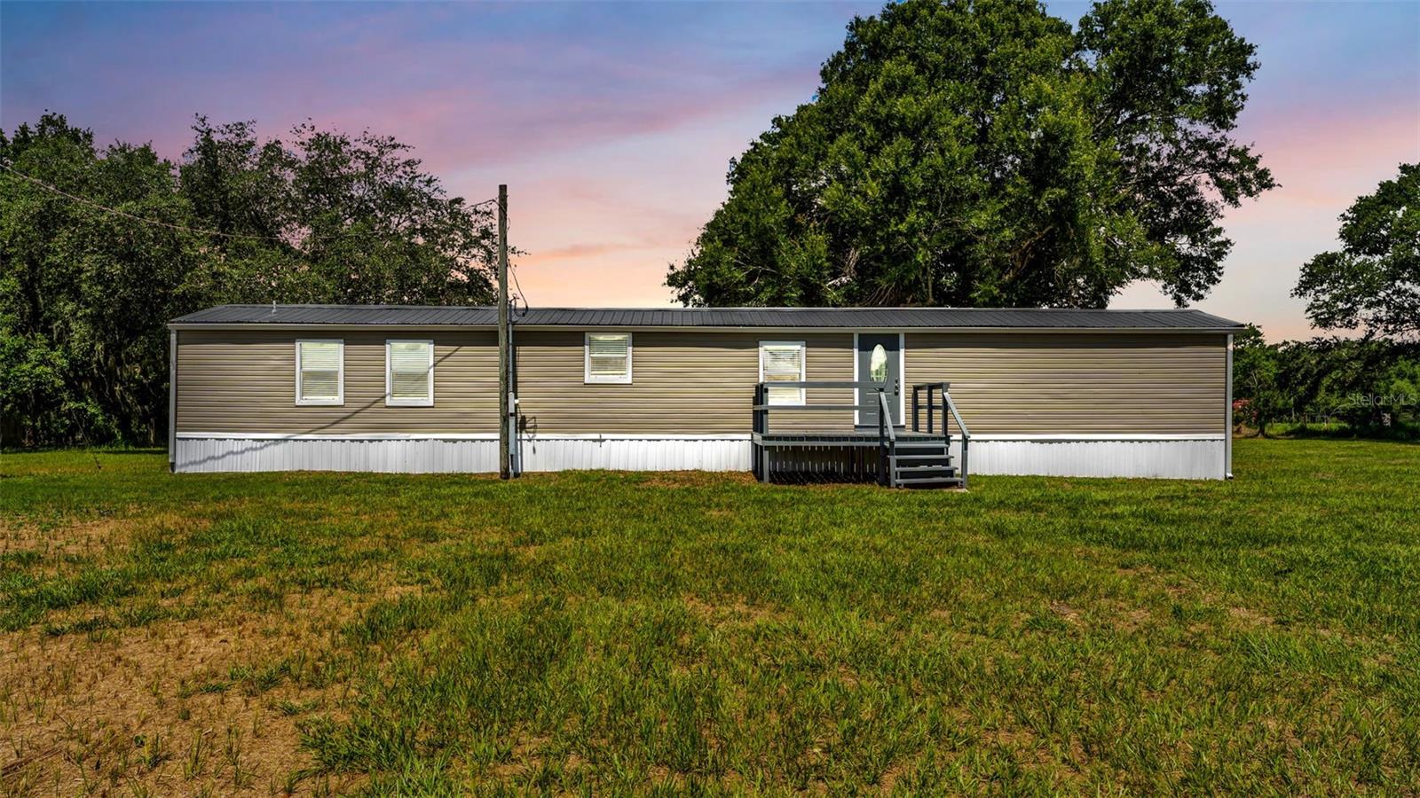 Welcome Home to 21 Ridge Rd, Frostproof, Florida—a rare opportunity to own a beautifully maintained property offering privacy, space, and modern upgrades on more than 5 acres of high and dry land.
This inviting home showcases quality improvements throughout, from upgraded crown molding to baseboards, and everything in-between.
The kitchen is equipped with all-new appliances, providing both style and functionality for everyday living and entertaining.
Outside, you'll find over 5 acres of meticulously manicured, usable land with plenty of room for horses, recreational vehicles, gardening, additional buildings, or simply enjoying the peaceful Central Florida lifestyle. The dry acreage offers flexibility and peace of mind while creating a picturesque setting surrounded by natural beauty.