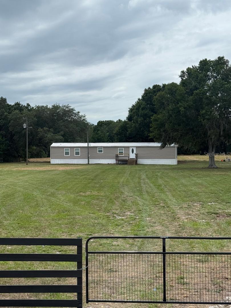 Welcome Home to 21 Ridge Rd, Frostproof, Florida—a rare opportunity to own a beautifully maintained property offering privacy, space, and modern upgrades on more than 5 acres of high and dry land.
This inviting home showcases quality improvements throughout, from upgraded crown molding to baseboards, and everything in-between.
The kitchen is equipped with all-new appliances, providing both style and functionality for everyday living and entertaining.
Outside, you'll find over 5 acres of meticulously manicured, usable land with plenty of room for horses, recreational vehicles, gardening, additional buildings, or simply enjoying the peaceful Central Florida lifestyle. The dry acreage offers flexibility and peace of mind while creating a picturesque setting surrounded by natural beauty.
Pictures Coming Soon!
