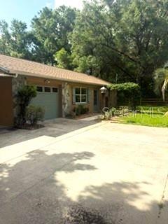 Affordable, insurable, and ready to move in with a newer roof 2024 and water heater 2025. Great central location with plenty of room for everyone. The back room 10 x 16 has A/C and heat and can be used as a porch, family room, office, or another bedroom. Newer appliances and flooring, recently painted inside. No need to use the garage to store all you stuff- there is also a large storage building out back. Carpot for your boat and everything has its place. Just bring your personal items and move in. Great location close to everything-- schools, Inverness with the new Home Depot coming and all the events downtown, Lecanto with all the new stores and restaurants, and Ocala just 30 minutes away.