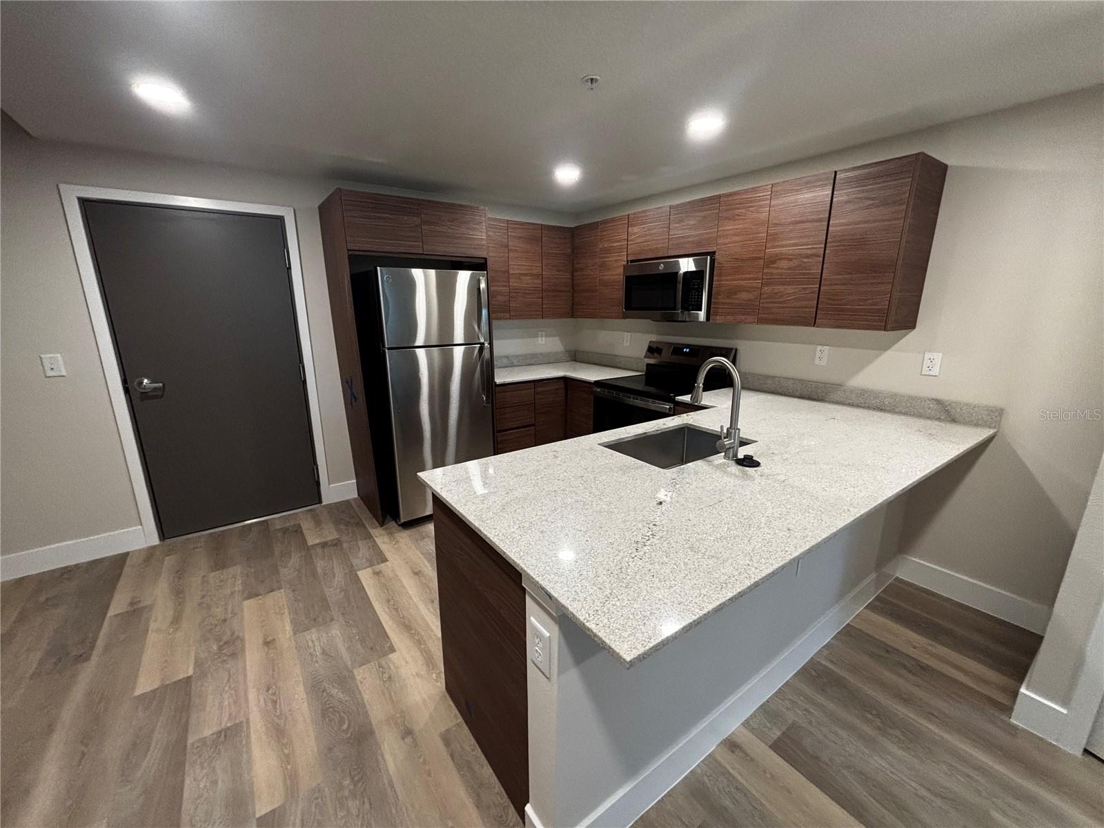 Less of 10 minutes away from The Mall at Millenia, great location. Be the first to live in one of Orlando's newest communities. This 1-Bedroom / 1-Bathroom residence offers an open-concept layout, abundant natural light, and modern finishes throughout. Conveniently located just minutes from Universal Studios, International Drive, premier dining, shopping, and entertainment.The modern kitchen features brand-new stainless-steel appliances and contemporary cabinetry designed for both style and functionality.