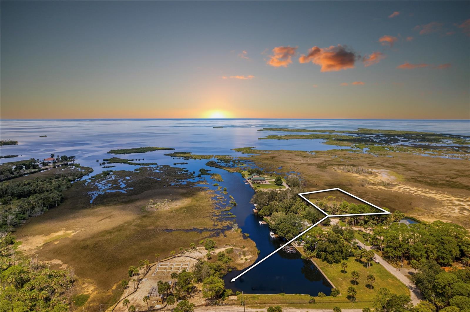 LOOKING for OMG STUNNING VIEWS of the Nature Coast & The Gulf? Are You a SUNSET WATCHER? Is PRIVACY Important? Would you like to use the Neighborhood Private Boat Ramp to go Inshore Fishing? These Lots are NOT on the Water however the Private Community Boat Lift is Right Around the Corner for access to the Gulf. This Fishing Village embodies the word ''Nature Coast'' & is Perfect for Inshore Fishing, Paddle Boarding and Kayaking. ARIPEKA Beauty is Truly Immersed in ''Old Florida'' Living yet is not too far from all amenities. The 4 Lots are 1.07 of an Acre (Approximately 300x150 ft) with about .43 of an Acre Usable Land (According to County Records). See The Topography on the Aerials (Lot Lines are Approximate). Call for More Information or to see the Video of this Quaint Fishing Village.