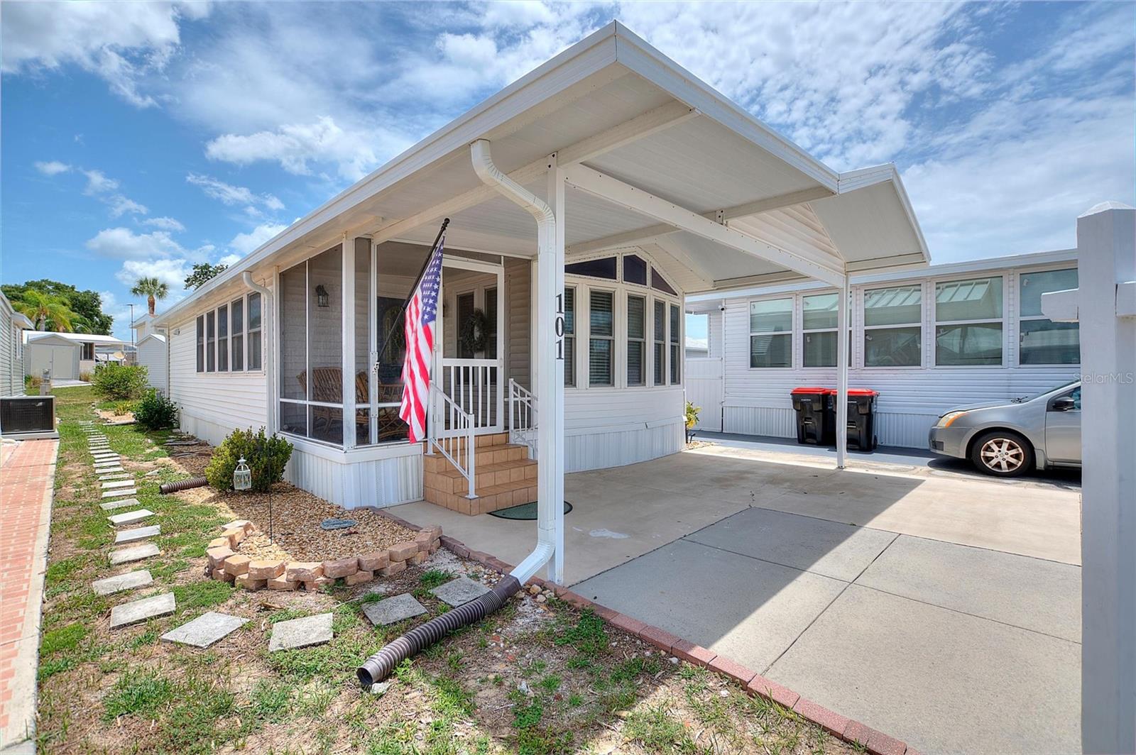 WELCOME TO DEER CREEK RV GOLF & COUNTRY CLUB! Enjoy RESORT STYLE LIVING at its best at this 55+ Gated Oasis! This TURNKEY STUNNING 2 bedroom, one and one half bath home is ready for new owners! Additional space with a daybed for extra guests! Discover the perfect blend of comfort, convenience, & resort style living in this well-maintained Florida Getaway located in the highly desirable Mockingbird Community! This inviting home offers everything you need to start enjoying the Florida sunshine! An updated kitchen you'll love with stainless steel appliances, nice countertops & cupboards! An open floorplan with laminate flooring throughout! Relax with your morning coffee on the front porch, spend your afternoons on the golf course or at the pool & enjoy evenings filled with entertainment & activities  with family & friends!  If you’re looking for the perfect spot in the sunshine state, this is it! Low HOA fees! Low Maintenance! Covered parking & shed for all your Florida toys! Mockingbird’s Clubhouse, Pool & Veranda is just a golf cart ride away offering aqua fitness classes, cards, fitness classes, cornhole tournaments & more! If you love RESORT style living, this is the place for you! Deer Creek’s MAIN CLUBHOUSE offers a variety of social events throughout the year such as Karaoke, Trivia, Line Dancing, Crafts, Swing Dancing & more! Soak up the sun at Deer Creek’s MAIN pool, cabana & hot tub area! Try water volleyball, pickleball, tennis, shuffleboard or aqua fitness classes! Love golfing? Check out Deer Creek’s 18 Hole Executive Golf Course Leagues & shopping at the Pro Shop! The Tiki Bar or The Topside Tavern is a great place to meet new friends with occasional live bands & music! The Greenside Grill is perfect for onsite dining! Grab a sandwich or dinner to go from the Greenside Deli & Ice Cream Shop! Deer Creek is centrally located in Davenport just 20 minutes from Disney & all the attractions that families enjoy! Hop on your golf cart & ride to many restaurants & shops nearby. Bealls, Marshalls, Target & Star Bucks are in Posner Park less than a mile away! A new Publix just opened across the street from the community! Call today to view this HIDDEN GEM in sunny Florida! Just 1.5 hours to each coast!