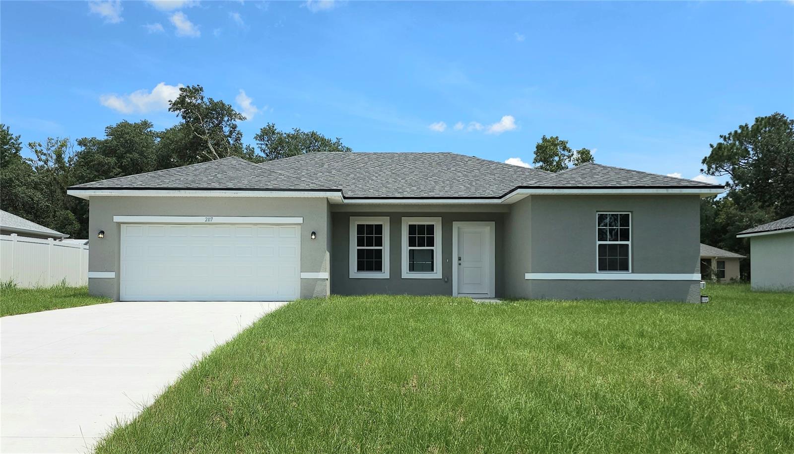 Zero deposit option available! Welcome home to this beautifully designed 4-bedroom, 2-bath, 2 car garage, residence offering modern style, spacious living, and everyday comfort.

From the moment you step inside, you will appreciate the bright open-concept layout, high ceilings, and oversized tile flooring that flows throughout the home for a clean, elegant look and easy maintenance.

The spacious kitchen is the heart of the home, featuring granite countertops, stainless steel appliances, sleek white cabinetry, and a large island perfect for entertaining, meal prep, or casual dining.

The expansive living and dining areas provide plenty of room to relax or host guests with seamless access to the backyard through sliding glass doors.

The private primary suite offers a peaceful retreat with a large bedroom, walk-in closet, and a beautifully upgraded en-suite bathroom complete with dual vanities, granite counters, and a stunning tiled walk-in shower with glass enclosure. The additional bedrooms are generously sized and share a stylish guest bath with upgraded finishes and designer tilework.

Outside, enjoy a spacious backyard with room to relax, play, or entertain. 

Conveniently located near shopping, dining, schools, and major roadways, this home combines comfort, functionality, and modern finishes in one exceptional rental opportunity.

This move-in ready home offers the perfect blend of style and practicality. Schedule your showing today!

Everyday conveniences are just a short drive away in nearby Dunnellon, where residents can find grocery stores, restaurants, and local shops. 
Residents enjoy nearby parks, such as Wesley Jones Park or one of the 27 trailheads for walking, biking, running, and rollerblading. The community is also close to major natural attractions, including Rainbow Springs State Park and the crystal-clear waters of Three Sisters Springs, where activities like kayaking, tubing, and manatee viewing are popular. With scenic trails, rivers, and year-round outdoor recreation nearby, Citrus Springs is ideal for tenants who value a relaxed, nature-focused lifestyle with convenient access to shopping, healthcare, and local amenities.