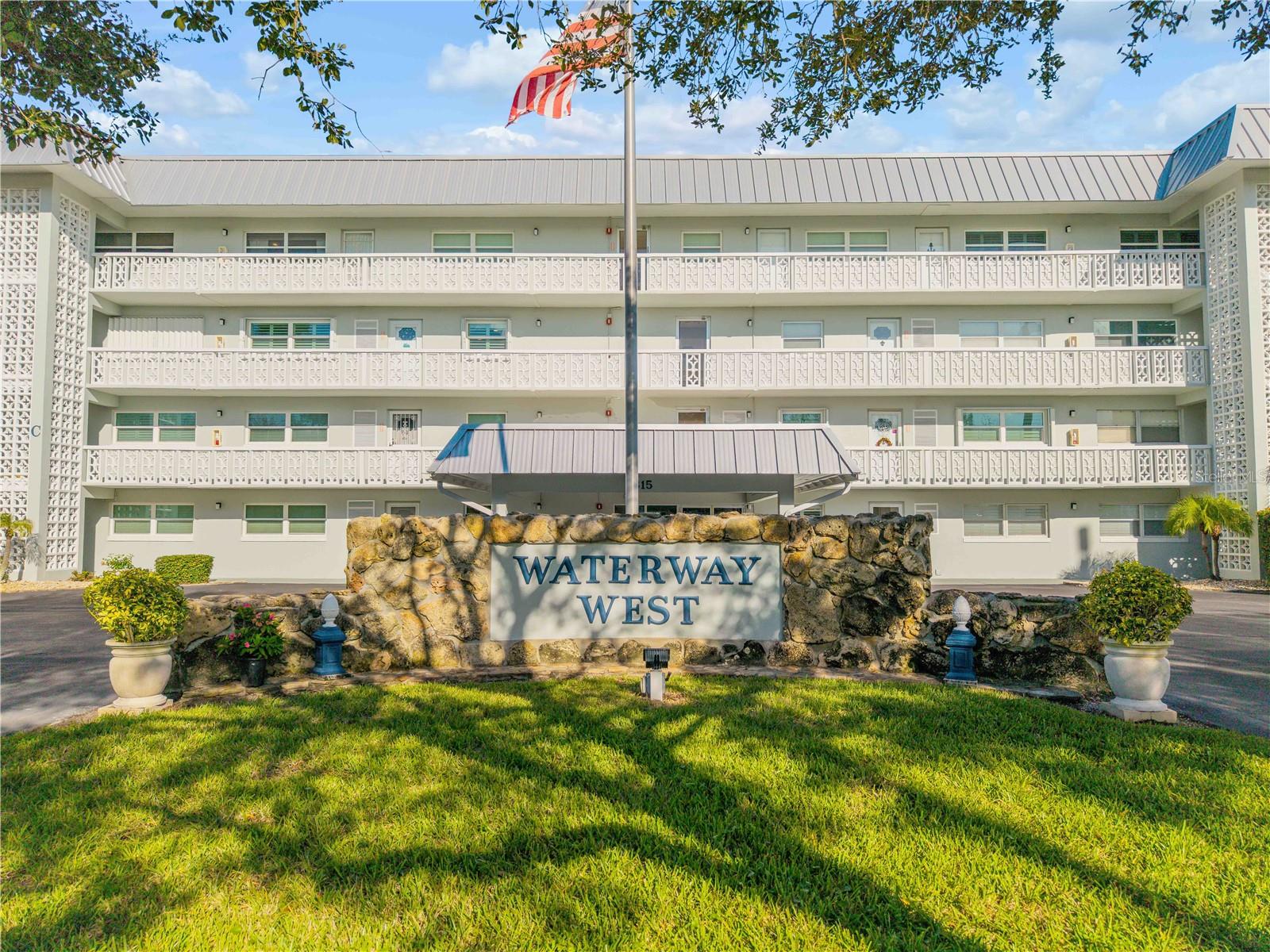 Enjoy water views and spectacular sunrise-to-sunset skies from this updated 2-bedroom, 2-bath condominium in the Waterway West community on North Causeway in New Smyrna Beach. Located on the third floor and positioned as a corner unit, this residence offers abundant natural light and water views from multiple vantage points.
The open floor plan provides comfortable living and entertaining spaces with seamless flow between the living, dining, and kitchen areas. Both bedrooms are generously sized, and the primary suite features an en-suite bath and direct access to the private balcony overlooking the canal.
Recent interior improvements include fresh paint, updated lighting fixtures, and ceiling fans throughout. All windows and sliding glass doors have been replaced with Low-E impact-resistant glass. Additional updates include a new HVAC system (2024), washer and dryer (2024), and oven and microwave (2023). The Waterway West community has also completed significant capital improvements, including new roofs, new carports, and re-plumbing of all units.
The private balcony offers canal views and western exposure for sunset viewing, while the third-floor corner-unit location provides additional eastern-facing water vistas and opportunities to enjoy both sunrise and sunset skies. The waterfront setting offers convenient access to kayaking, paddleboarding, boating, and other outdoor recreation.
Located on North Causeway, Waterway West provides convenient access to shopping, dining, beaches, marinas, Flagler Avenue, Canal Street, and the Marine Discovery Center. Suitable as a primary residence, seasonal property, or investment opportunity, this waterfront condominium combines recent updates, water views, and a desirable third-floor corner-unit location in the heart of New Smyrna Beach.