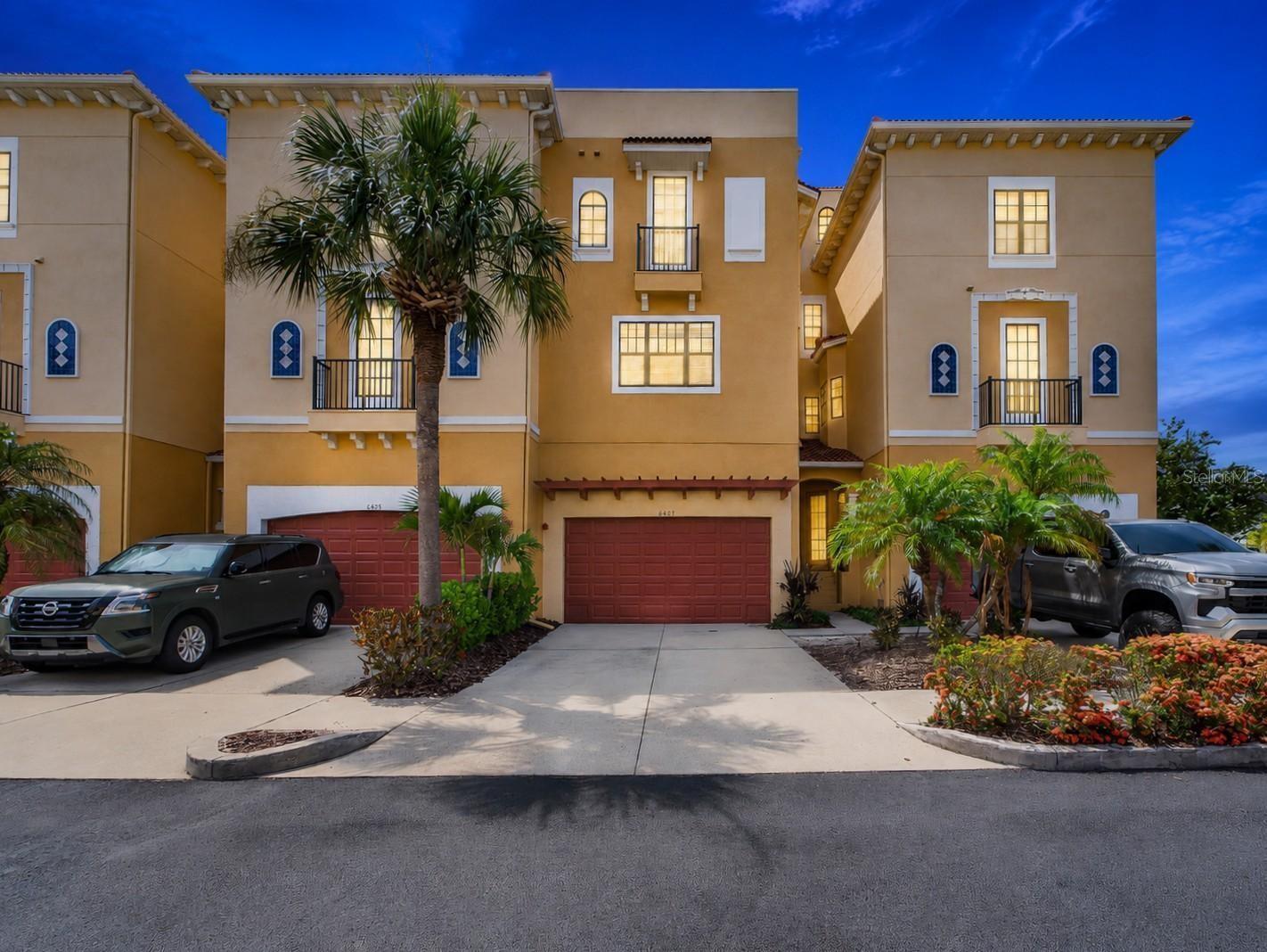 6407 Mayra Shores Lane | 4 Bedrooms | 2 Full and 2 Half Bathrooms | Four-Story Townhome with Private Elevator | Steps to the Water | Gated Brisa Del Mar, Apollo Beach

Discover a rare opportunity in the exclusive, gated Brisa Del Mar community, just steps from the water with the kind of coastal lifestyle that is hard to find and even harder to leave. Featuring a private elevator for effortless access to every level, this meticulously maintained and thoughtfully upgraded four-story townhome offers a truly turn-key experience that stands apart in today's market.

Every detail has been considered. Remote-controlled retractable screens have been installed across all three balcony levels, creating the perfect bug-free environment for morning coffee, evening entertaining, or simply soaking in the coastal breeze. The fourth-floor roof patio has been beautifully tiled, offering an outdoor retreat with open sky views that are simply hard to leave.

Inside, the home is as functional as it is beautiful. The first-level open space has been converted into a private fourth bedroom, ideal for guests, a home office, or a fitness room. The kitchen features refinished cabinetry, solid surface counters, and crown molding that flows seamlessly through the open-plan dining and living areas. The entire third floor is dedicated to the primary suite, offering a spacious walk-in closet and a spa-inspired bathroom with dual sinks, stone counters, and a separate tub and shower.

Recent upgrades bring added peace of mind: a brand-new water heater installed in 2026 and an HVAC system serviced in May 2026. The HOA covers exterior and grounds maintenance, water, sewer, pest control, and community pool access, making this a truly maintenance-free lifestyle.

Situated at the end of Apollo Beach Boulevard within the gates of Brisa Del Mar, you are steps from the water, minutes from the Apollo Beach Nature Preserve, and close to fine dining and everyday conveniences that make South Shore living so special.