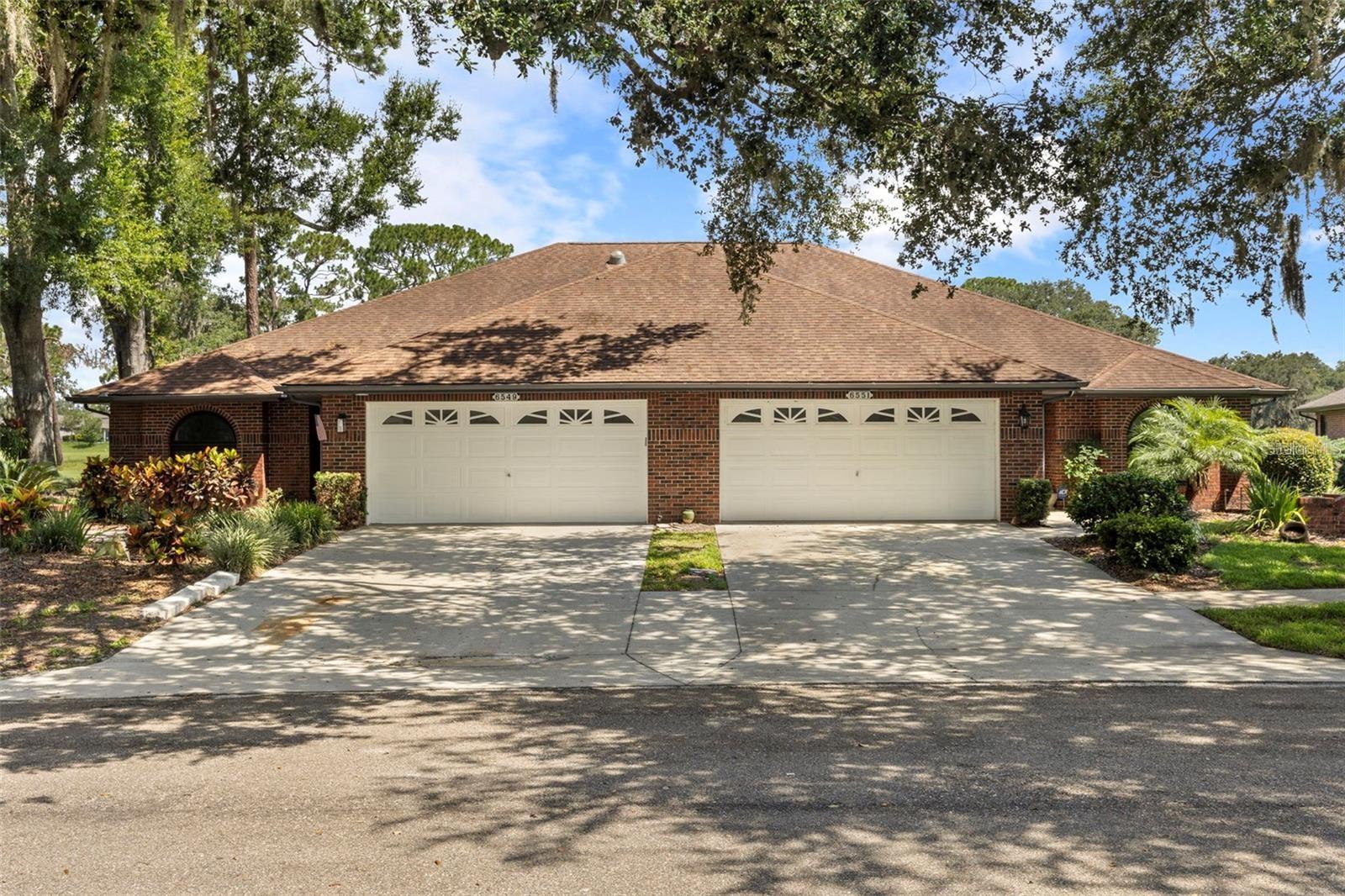 Luxury Renovated Golf Course Villa in Silver Oaks | Move-In Ready

Experience effortless Florida living in this completely renovated 2-bedroom, 2-bath villa overlooking the beautiful Silver Oaks Golf Course. Renovated from top to bottom in 2025, this move-in-ready home combines modern luxury, thoughtful design, and exceptional functionality.

Step inside to an open-concept floor plan featuring luxury vinyl plank flooring throughout, soaring vaulted ceilings, skylights that flood the home with natural light, and a stunning custom wood slat accent wall with a sleek electric fireplace, creating the perfect focal point for relaxing or entertaining.

The designer kitchen is both stylish and functional, showcasing a large center island, brand-new stainless steel appliances, a counter-height microwave for added convenience, an oversized pantry, and a custom built-in beverage bar with a wine refrigerator—perfect for hosting family and friends.

French doors lead to a bright and spacious Florida Room, providing additional living space while offering picturesque golf course views, making it the ideal place to enjoy your morning coffee or unwind at sunset.

The spacious primary suite features dual vanities, a beautifully designed walk-in shower, and generous closet space, while the second bedroom and updated guest bath provide comfort and privacy for family or guests.

Additional highlights include a 2-car garage with an epoxy-finished floor, brand-new garage door opener, and a dedicated laundry area with washer and dryer hookups.

Located in the highly desirable Silver Oaks Golf Community, residents enjoy a peaceful setting with convenient access to golf, shopping, dining, medical facilities, and major highways.

Every major interior finish has been thoughtfully updated—simply move in and start enjoying the Florida lifestyle. Schedule your private showing today!