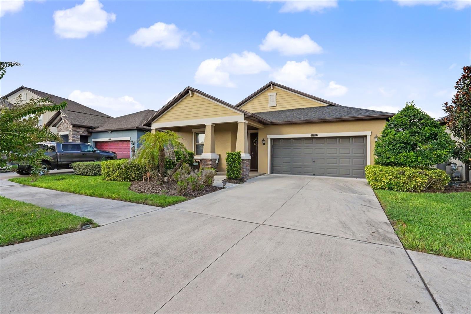 Better Than New! Welcome to effortless Florida living in the award-winning Connerton community. This beautifully maintained 2020 residence offers the perfect combination of modern design, comfort, and everyday luxury. From the moment you enter, you'll appreciate the spacious open-concept floor plan, abundant natural light, and seamless flow that's ideal for both entertaining and daily living. Built by Lennar's luxury division, you will cherish the coffered ceiling, crown molding, and oversized tile flooring this home showcases. The chef-inspired kitchen serves as the heart of the home, featuring generous cabinetry, ample prep space, and a large center island overlooking the main living area. The private owner's suite offers a relaxing retreat with a spacious walk-in closet that leads to the laundry room and well-appointed bath which features a soaking tub and separate shower.  The split-bedroom layout, with two bedrooms and a bath separated from a third bedroom and bath, provides comfort and privacy for family and guests. Step outside to the covered screened lanai and enjoy peaceful Florida evenings in your own backyard with a beautiful pond view. Located in the sought-after Connerton community, residents enjoy resort-style pools, fitness center, parks, playgrounds, scenic walking trails, and convenient access to shopping, dining, schools, and major highways. Skip the wait for new construction—this move-in-ready home is available now.  Sellers are motivated and a quick close is possible.