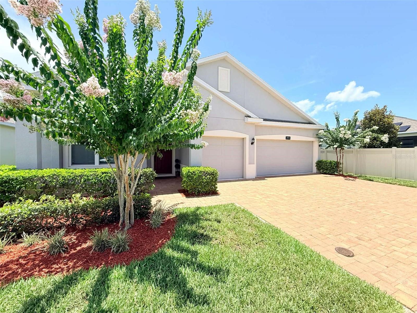 Move-in ready luxury awaits in the highly sought-after Hanover Lakes community! This exceptional model is perfectly situated on an expansive, premium 60-foot-wide homesite, offering breathtaking, picturesque waterfront views.
From the moment you arrive, the brick-paver driveway and elegant lead walk set a grand tone. Inside, you are greeted by soaring, elevated ceilings and 5 1/4" colonial-style baseboards. The highly desirable, split-floorplan layout features 4 spacious bedrooms, 2 full baths, and a massive 3-car garage. A versatile formal living room and dining room at the entrance.
At the heart of the home, the open-concept family room flows seamlessly into the upgraded chef’s kitchen, complete with designer cabinetry, premium solid-surface countertops, stainless steel appliances, and a stunning tile backsplash. Step outside through the sliders to your extended covered lanai, the ultimate backdrop for outdoor dining and entertaining against serene water vistas.
The master suite is a true sanctuary, the master bathroom has a boasting adult-height dual vanities with quartz countertop and beautiful walk-in shower, the secondary bedrooms are located in the opposite side of the master suite for privacy. 

Hanover Lakes community offers an unparalleled lifestyle. Boaters and nature lovers can directly navigate the pristine, spring-fed Alligator Chain of Lakes, famous for trophy bass fishing and unspoiled, cypress-lined shorelines. Neighborhood amenities include a resort-style pool, splash pad, and an expansive sundeck. Strategically located with quick highway access, you are just minutes from Disney World, Universal Studios, SeaWorld, Downtown Orlando’s premier sports and cultural venues, and a convenient drive to the Atlantic beaches. Schedule your private appointment today!