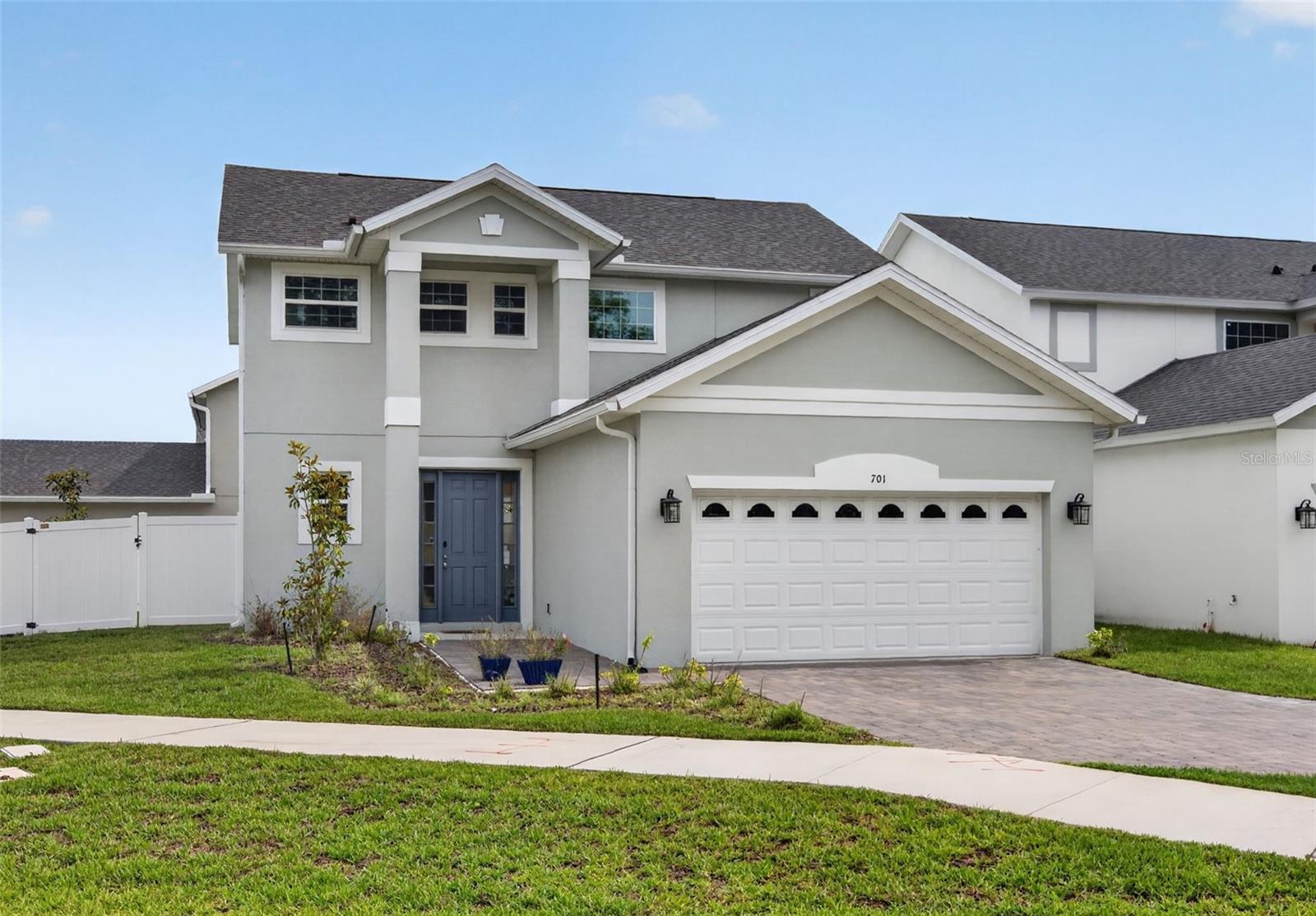 Welcome to this beautiful home with 3 bedrooms, 2.5 bathrooms, and lake views from a private corner homesite in the heart of Orlando. Step inside to discover a bright and airy open-concept floor plan featuring abundant natural light, and a spacious living area with luxury vinyl floors downstairs. The designer kitchen is the centerpiece of the home, complete with quartz countertops, stainless steel appliances, a large center island with seating, and a stylish tile backsplash. Conveniently located on the first floor, you'll find a dedicated laundry room and a guest powder bath. Upstairs, all three bedrooms provide comfortable accommodations, including a generously sized primary retreat featuring a walk-in closet and a luxurious ensuite bath with dual quartz vanities, a walk-in shower, and a relaxing soaking tub. Outside, the fully fenced backyard is designed for both entertaining and everyday enjoyment. Relax on the covered back patio, host family and friends, or practice your short game on the putting green. The oversized corner lot offers an exceptional combination of privacy, outdoor space, and picturesque surroundings, with water views! And enjoy the peace of mind with multiple years remaining from the builder warranty. Ideally situated just minutes from Winter Park, Baldwin Park, a 20 minute drive to Orlando MCO Airport, or a 35 minute drive to the Disney theme parks, this home combines modern living, thoughtful design, and an unbeatable location. Don't miss your opportunity to make it yours and schedule your private showing today.