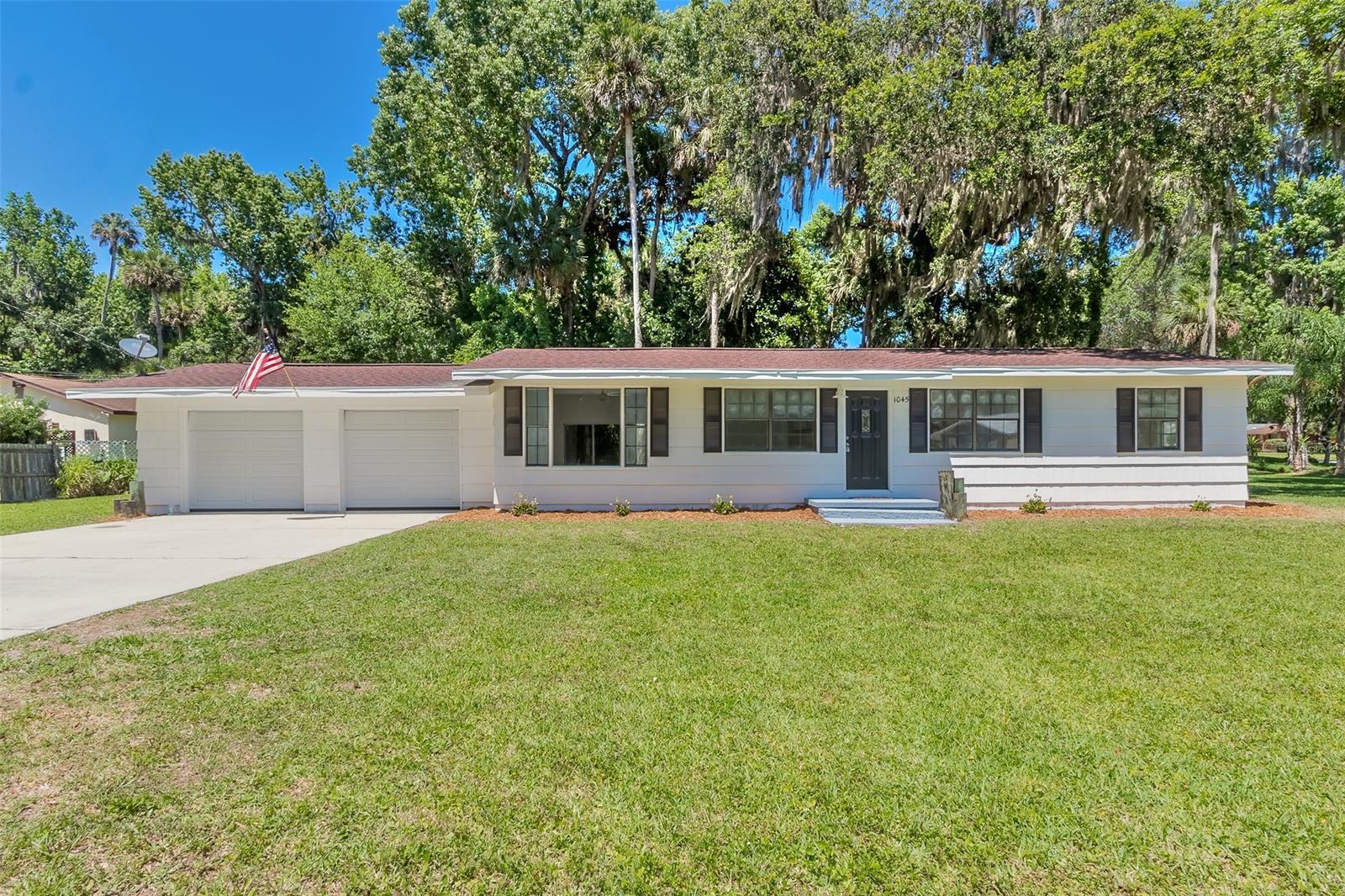 NEED HELP WITH CLOSING COSTS? SELLER SAYS YES! Buyer will be provided $5000 toward closing costs and prepaids at closing! Beautifully renovated 3/2 home on large corner lot in semi-rural Corbin Park sub. Located at the corner of Swoope and Corbin Park, this home has everything you need to enjoy everyday fine living. Newly updated interiors include New kitchen with soft close cabinets and stunning Quartz countertops along with New Stainless appliances. Newly updated bathrooms with beautiful tile baths and showers, new hot water heater, new interior light fixtures and ceiling fans along with new interior and exterior paint and trim.  Beautiful laminate flooring throughout completes these modern interiors. The large garage has newly installed garage doors with new electric openers. Plenty of room for cars and other toys. The large concrete patio overlooks a beautifully shaded and treed backyard area perfect during the warm summer days. Both the roof  (2018) and HVAC are both newer and in nice condition. SUPERIOR location right in the heart of NSB. Close to all shopping, restaurants and only a 15 min ride to the beach. Inspections are welcomed. Come see... ;Water: City