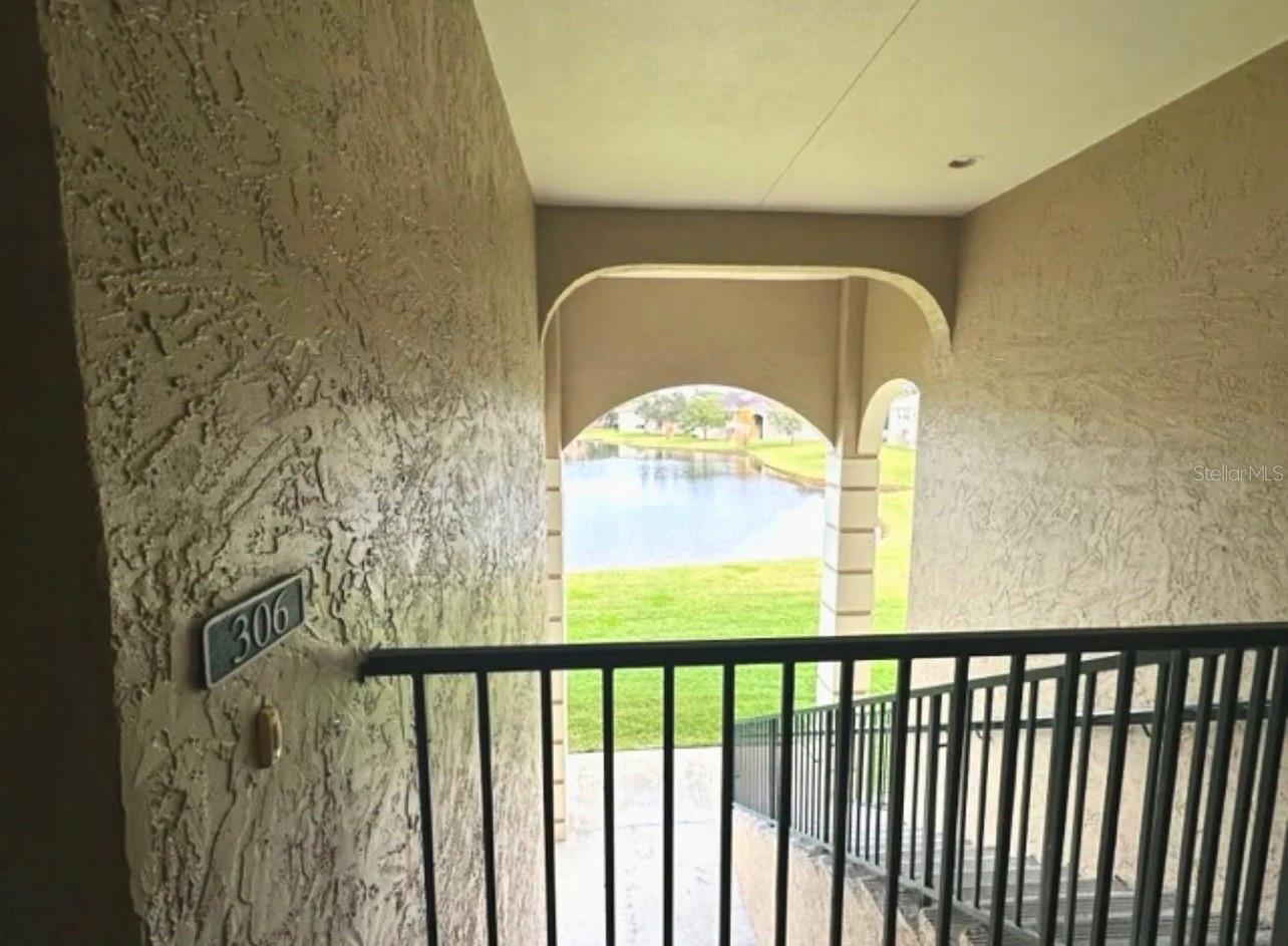 Beautiful completely updated condo in the highly desirable gated community of Cypresswood Golf and Country Club. It features tile flooring throughout the whole condo, marble kitchen countertops with an extended breakfast island, matching marble on both bathroom vanities, upgraded lighting fixtures/ceiling fans, interior laundry with washer and dryer, pond view, and so much more. The master bedroom features an en suite bathroom while both bedrooms have a walk-in-closet. Additional linen storage exists in the main bedroom and hallway, plus an additional outside storage closet with shelves. The Cypresswood community features an 18-hole championship golf course designed by Ron Garl, junior Olympic sized community pool, lighted tennis courts, clubhouse with a restaurant, event space and more. Minutes from Hwy 27 and the I-4 corridor, Winter Haven's chain-of-lakes for the water enthusiast, Legoland Fl Park and Resort, Bok Tower gardens, and a  brand new Publix shopping center within 2 miles and much more. Centrally located between Orlando and Tampa. Schedule your private showing today.