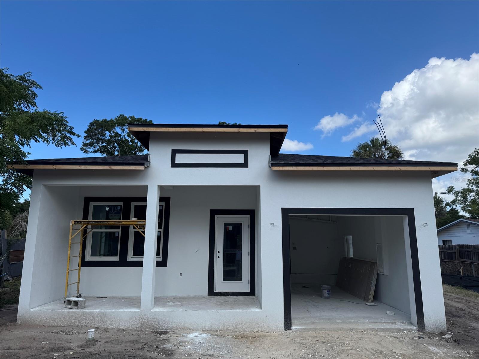 Pre-Construction. To be built. Discover this stunning 4-bedroom, 2-bathroom home nestled in Safety Harbor, just minutes from downtown. The builder has spared no detail, incorporating designer finishes and luxury upgrades throughout. The moment you enter, you'll be captivated by the luxurious vinyl flooring that stretches across the home, offering durability and a chic aesthetic. The kitchen stands as the heart of the home, featuring custom wood cabinets and high-end appliances that blend function with beauty, providing the perfect backdrop for culinary creations. Each bedroom is a spacious retreat with its own walk-in closet, ensuring ample storage and a touch of elegance. You have terraces on both the front and rear of your home, perfect for a relaxing morning coffee or an evening glass of wine. Located in the much sought-after Safety Harbor just minutes from the vibrant downtown, as well as Old Tampa Bay and Tampa International Airport, this gem is ideally situated for both convenience and luxury. Contact us today for more details. Images shown are renderings used for illustration and reference purposes only, and do not necessarily reflect exact finishes and fixtures of the final project upon completion. Estimated completion is June 2026.