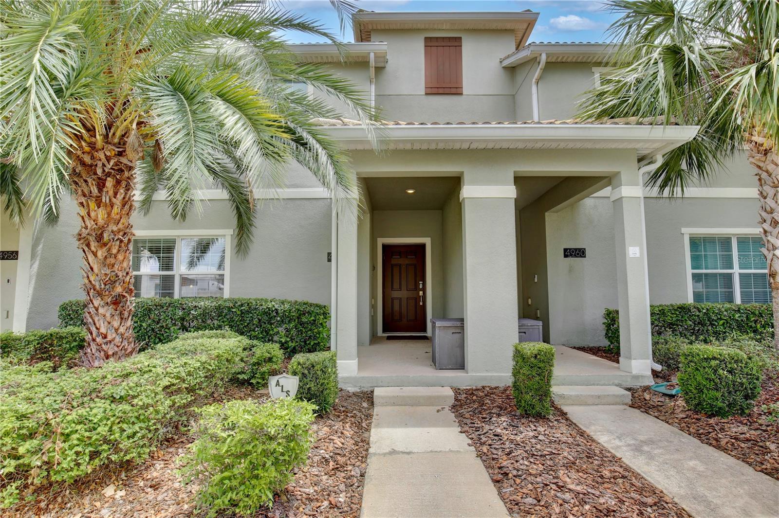 Welcome to 4958 Windermere Avenue, a beautifully maintained 4-bedroom, 3-bathroom turnkey vacation rental located in the highly sought-after Storey Lake Resort, just minutes from Walt Disney World, Disney Springs, and Orlando's premier attractions.

Designed for both relaxation and investment potential, this fully furnished townhome features a spacious open-concept floor plan with stylish décor, modern finishes, and plenty of room for family and guests. The well-appointed kitchen offers granite countertops, stainless steel appliances, and abundant cabinetry, flowing seamlessly into the dining and living areas to create the perfect gathering space.

A first-floor bedroom and full bathroom provide convenience and flexibility for guests, while upstairs you'll find the spacious primary suite, two additional bedrooms, another full bathroom, and a laundry area.

Step outside to your private screened lanai featuring a heated plunge pool overlooking serene waterfront views. One of the standout features of this property is its premium location with no direct rear neighbors, allowing you and your guests to enjoy peaceful water views and enhanced privacy while relaxing poolside after a day at the parks.

Storey Lake Resort offers an unmatched resort lifestyle with a stunning clubhouse, resort-style swimming pool, lazy river, water slides, splash park, mini-golf course, kayak rentals, sand volleyball courts, fitness center, and poolside tiki bar serving food, drinks, and frozen treats.

Whether you're looking for a personal vacation retreat, a high-performing short-term rental investment, or both, this turnkey property is ready to generate income from day one. Located within a 24-hour gated community, you'll enjoy easy access to shopping, dining, entertainment, golf, Orlando International Airport, and all of Central Florida's world-famous attractions.

Don't miss this opportunity to own a waterfront vacation home with private views, resort amenities, and exceptional rental potential in one of Orlando's most desirable vacation communities.