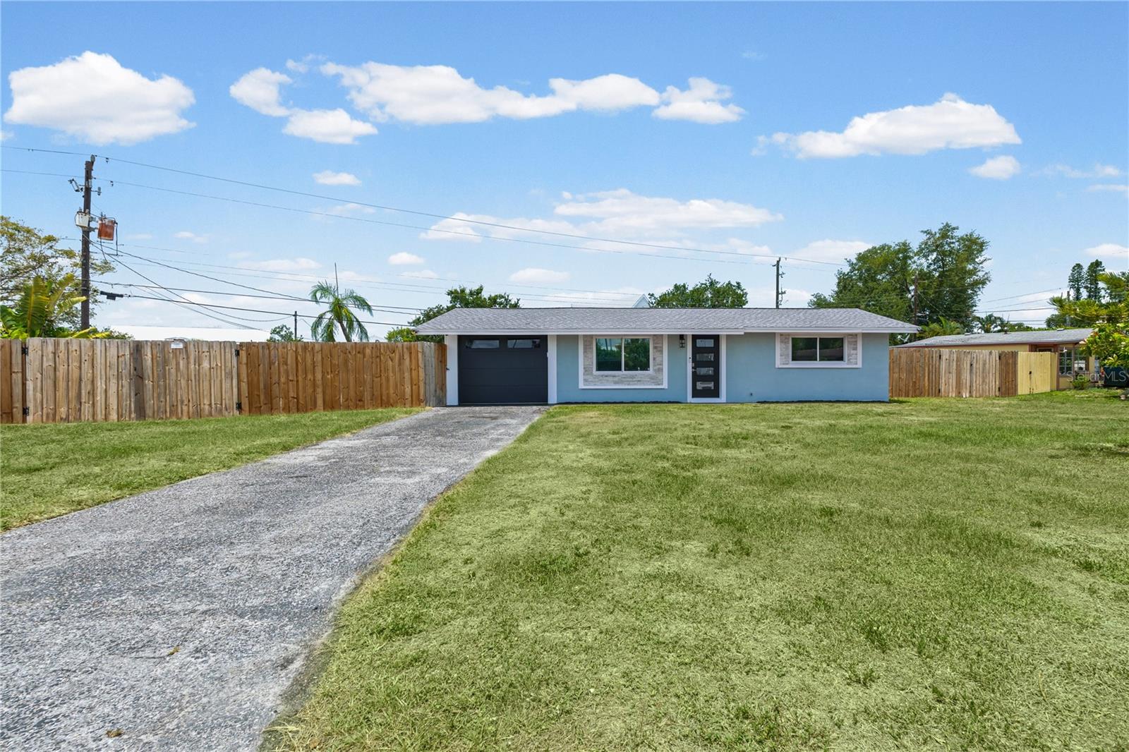 Virtually Staged. Charming West Bradenton Home on an OVERSIZED CUL-DE-SAC LOT | NO HOA | Move-In Ready! Beautifully updated and situated on an oversized, FULLY FENCED LOT with a brand-new privacy fence and TWO side GATES for easy access, there's plenty of room to add a pool, park your toys, or simply enjoy the expansive backyard. Major updates include a 2023 ROOF, a 4-year-old A/C (still under warranty) with fully REPLACED DUCTWORK, a 2-year-old water heater, and HURRICANE-IMPACT WINDOWS throughout. Inside, you'll find FRESH interior PAINT, TILE FLORRING THROUGHOUT, granite countertops, and a SUNROOM with oversized windows overlooking the generous yard. NEW kitchen appliances, WASHER and DRYER, and BLINDS throughout are all included, making this home truly move-in ready. An ADDED BONUS is the attached garage, which is already serviced by the home's central A/C system. The airflow is currently blocked off, but it can be easily restored. With proper insulation and finishing, the garage offers excellent potential to be converted into a third bedroom, home office, gym, or additional living space if desired. Conveniently located just 12 minutes from downtown Bradenton and the Bradenton Riverwalk, you'll enjoy easy access to local restaurants, shops, waterfront parks, and entertainment. Everyday conveniences are just minutes away with Centre Point Commons, Cortez Plaza, and numerous dining and shopping options nearby. UTC Mall is approximately 30–35 minutes away. Spend your weekends on the world-famous beaches of Anna Maria Island, only 25–30 minutes away, while IMG Academy (15–18 minutes) and HCA Florida Blake Hospital are both within easy reach. This home offers the ideal blend of location, updates, and outdoor space, ready for you to move in and enjoy.