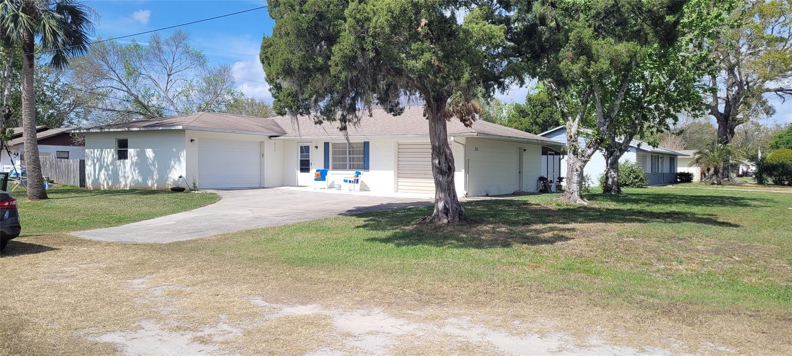Bright, spacious and well maintained 2 bedroom, 2 bath concrete block home on corner lot. This adorable home features 2 separate 1 car garages, 18 x 9 glass enclosed florida room, separate screened patio, bonus room perfect for office or even 3rd bedroom. Roof on house approx 6 years old, ac unit approx 2020, outside shed. All information in MLS deemed accurate but cannot be guaranteed and is to be verified by buyer and or agent, ;Water: City