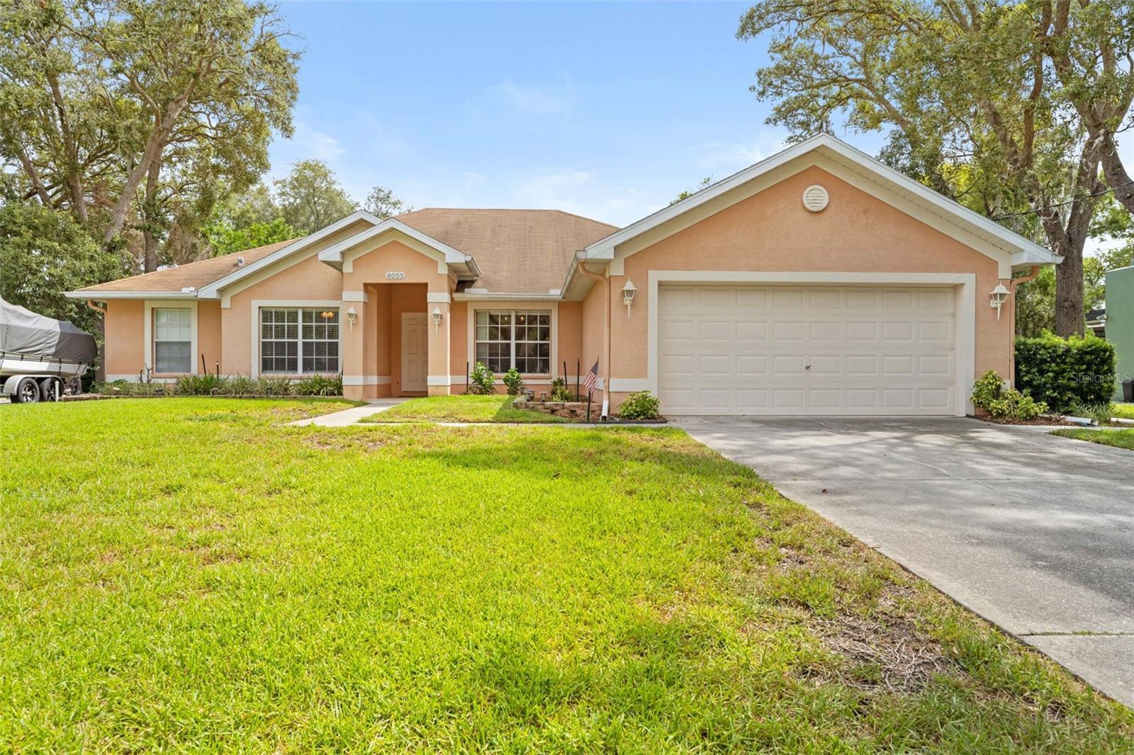 Seller is offering a generous roof credit with an acceptable offer, giving buyers the opportunity to replace the roof after closing and choose the roofing materials and color they prefer.

From the moment you step inside, you’ll appreciate the spacious and functional layout. The foyer welcomes you with a formal living room to the left and a formal dining room to the right. This home features a true split-bedroom floor plan, offering added privacy with the primary suite on the left side of the home and the two additional bedrooms on the opposite side.

The spacious great room features vaulted ceilings and flows seamlessly into the tiled kitchen and breakfast nook. The kitchen offers a breakfast bar and plenty of cabinet and counter space for everyday living and entertaining.
The primary suite is a relaxing retreat with dual walk-in closets, dual vanities, a garden tub, and a separate walk-in shower. Both secondary bedrooms also feature walk-in closets, providing plenty of storage.

Additional highlights include an inside laundry room, paneled interior doors, attic storage, ceiling fans throughout, and a fully fenced backyard that’s perfect for kids, pets, or entertaining. Don’t miss this opportunity to own a well-designed home with a seller-paid roof credit, allowing you to update the roof on your own timeline while adding value to your investment.