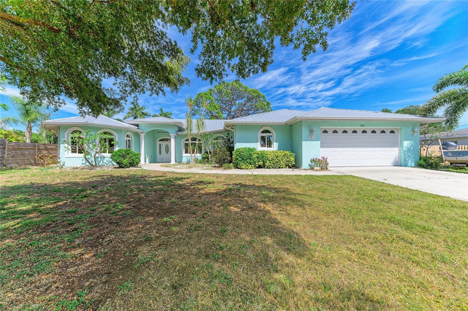 This custom built home is located in the Osprey subdivision Bay Acres, an established neighborhood along Little Sarasota Bay between Sarasota and Venice.  It's location allows easy access to I-75, top rated schools to include the magnet school Pine View , and Nokomis and Siesta Beaches, and all amenities of both cities.  This home includes over 4000 sq ft of total space that includes a 2 plus car garage with over 1400 sqft of space-  part of the garage having a large open area previously used as a hobby room that can be converted to an area to meet your needs.   The interior of the home has many nice features including a very nice large kitchen , dining room with tray ceilings, floors are gorgeous-real hardwood and wide planked.  This well built home has impact windows, a metal roof, a large covered porch and fenced yard.  Thsi small waterfront community will allow you to keep your Boat/Trailer or RV on your property.  Bay Acres also has some boat slips and Kayak storage for a small fee.  You can be out in Gulf waters in minutes.  Around the corner is Blackburn Point Boat Ramp, and many waterfront restaurants.  Come see why this friendly neighborhood and home can make your dreams a reality.