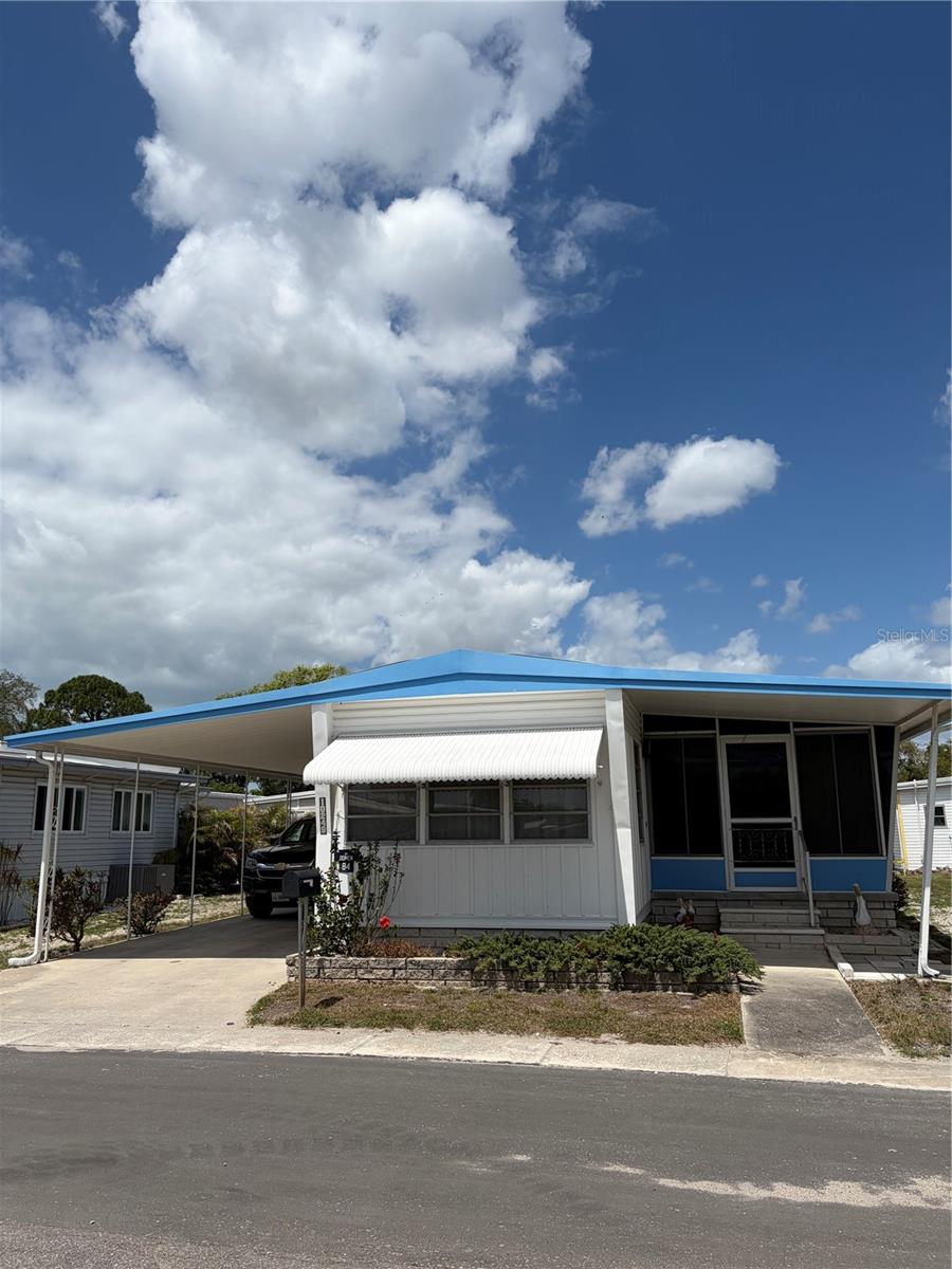 Wow Large 1/1 in Holiday Shores Lake Front Resident Owned Park! 2 Small Pets allowed ,Share Value $65,000.00 and Low Monthly fee of $200.00, and No Renting. This  home is Solid and has a Large Great Room floor-plan and elevated Ceilings, that make this home feel larger. Great hidden Gem for fixer-upper or decorator to update this home to your wishes!   Large Florida Room to enjoy the Beautiful Sunny Florida Winters!  Oversized and extra long 2 -car Covered Carport for all you vehicles.This park sits along Lake Seminole, one of the most beautiful in Pinellas County. Enjoy all the Activities and Social gatherings in the Spacious Updated Clubhouse. Billiards, Exercise area, Card Groups, and fun Pot-lucks!  Heated Pool, Covered Shuffle-board Courts, Private Fishing areas and a Community boat ramp for kayaking or boating on the Lake. Nice park-like settings with a Gazebo, and a chipping green. Close to the beautiful Gulf Beaches and less than an hour to 2 Major Airports! Enjoy Year Round  Major Sporting Venue"s! This  Truly is Florida living at its Best!