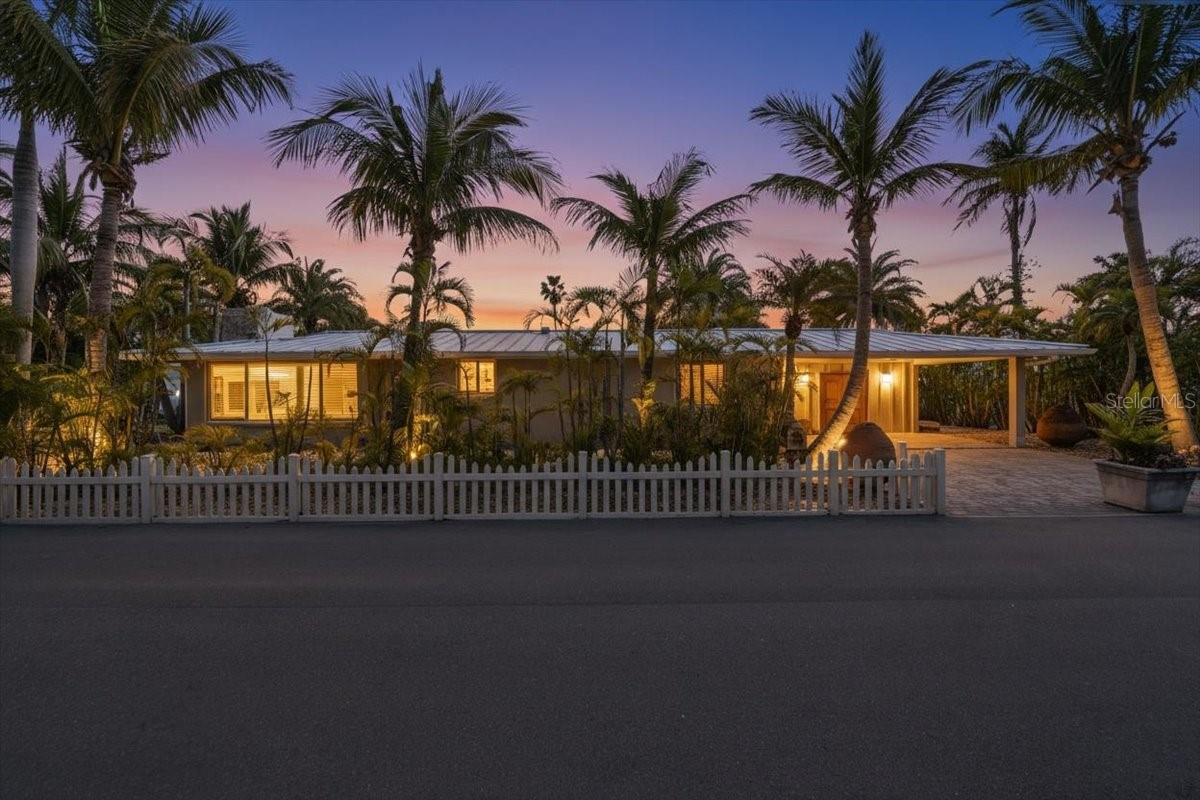 One or more photo(s) has been virtually staged. Situated on an expansive 11,250-square-foot lot, this property offers the perfect canvas to either remodel the existing home into a modern retreat or design a custom coastal estate from the ground up. The oversized lot provides ample room to create a private outdoor oasis, complete with a large pool, while enjoying a deep-water dock that is just seconds from the open water. Located just a short walk from some of the world’s most renowned white-sand beaches and only minutes from the charming shops and restaurants of the island, this property represents the ultimate blend of lifestyle and potential. Don’t miss this chance to own a piece of paradise and build your legacy on the water. Schedule your private tour today to explore the endless possibilities this rare site has to offer!
