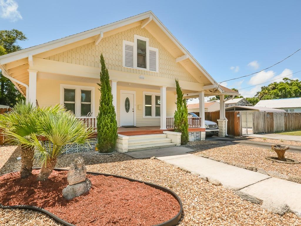 Charming 1920's home on huge double lot. This 3/1 has location and potential all over it. Centrally located in Daytona Beach.  Literally down the street from three colleges.  Walking distance to the river, shopping, restaurants, City Island and event centers.  Our world famous race track, the international airport, and I95 are all about a 15 minute drive. The home sits on the south side of a double lot. This leaves tons of room for a two car garage and two double car ports.  This is where the potential delights.  This home is perfect for an investor.  College students, race fans, bikers and Spring breakers would love this home and lot.  Small business owners can drive their business trailers, trucks or vans right into a fenced in paved area. If you fall in love with the home, there is a unique stare case that leads to the unfinished second floor.  This could be a master suite, an office, a playroom, a workout room, a man-cave or a sewing attic; potential, potential, potential. Original wood floors throughout the first floor.  The homes plumbing and electric have been updated. Bathroom and kitchen were updated 2004.  There is an alarm system built in. Central air and heat.  Windows upgraded.  Still 10 years on the roof.  Doors from the kitchen leading out to a large deck and pavers.  Quiet cul-de-sac off of International Speedway. ;Water: City