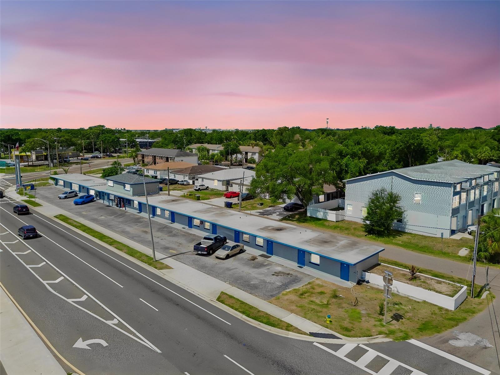 Own an irreplaceable hard corner in the heart of South Tampa. Positioned on the signalized corner of S Dale Mabry Highway and Interbay Boulevard — one of South Tampa's busiest commercial arteries, carrying 50,000 vehicles every day, with over 338' of frontage on S Dale Mabry Hwy — 6409 S Dale Mabry Hwy is a rare income-producing and redevelopment-ready commercial property in a supply-constrained, high-barrier-to-entry submarket. Operating today as the Base Motel by OYO, the property delivers an in-place hospitality foundation while offering significant upside for an investor, owner-user, or developer to reposition or redevelop one of the last value-priced corners on the corridor. It sits a stone's throw from MacDill Air Force Base, Picnic Island, Gadsden Park, Bayshore Boulevard, and the Gandy connector to St. Petersburg.

The property comprises a ±7,044 SF concrete block building (±5,688 SF heated/conditioned) situated on a ±0.41-acre (±18,064 SF) corner parcel, zoned CG — Commercial General, City of Tampa. Originally built in 1969 and renovated in 2000, the building is configured as a single-story, 14-room limited-service motel with exterior corridors, high-speed internet, and an asphalt-paved parking field with 24 spaces, plus a built-in on-site residential apartment with Central AC. The CG zoning, corner exposure, generous frontage, and flexible footprint make the site adaptable to a wide range of commercial uses well beyond its current hospitality operation — such as live/work professional offices and studios or retail suites — with no Airbnb or short-term-rental restrictions.

For a developer or owner-user, the real story is the dirt and the zoning. The surrounding stretch of Dale Mabry is dominated by strong-performing retail and strip-center real estate, and recent qualified strip-center sales on the corridor have traded at roughly $245 to $346 per building square foot — with premium Dale Mabry and Kennedy corridor products reaching well above that. Against the subject's modest in-place basis as an older motel, that spread represents a clear path to value creation through repositioning, renovation, or ground-up redevelopment into higher-and-better commercial use such as retail, restaurant, office, or mixed commercial.

Location is the enduring advantage. South Tampa is one of the Tampa Bay region's most affluent and desirable submarkets, anchored by MacDill Air Force Base — a major regional employer roughly five minutes south — and surrounded by established, high-income residential neighborhoods including Ballast Point, Bayshore Beautiful, Gandy, and Port Tampa. The immediate West Interbay trade area combines dense rooftops, strong household incomes, and steady daytime traffic, while Dale Mabry itself functions as the spine of South Tampa retail. Demand for well-located commercial real estate in this corridor has remained durable through cycles, and infill opportunities on a true hard corner rarely come to market.