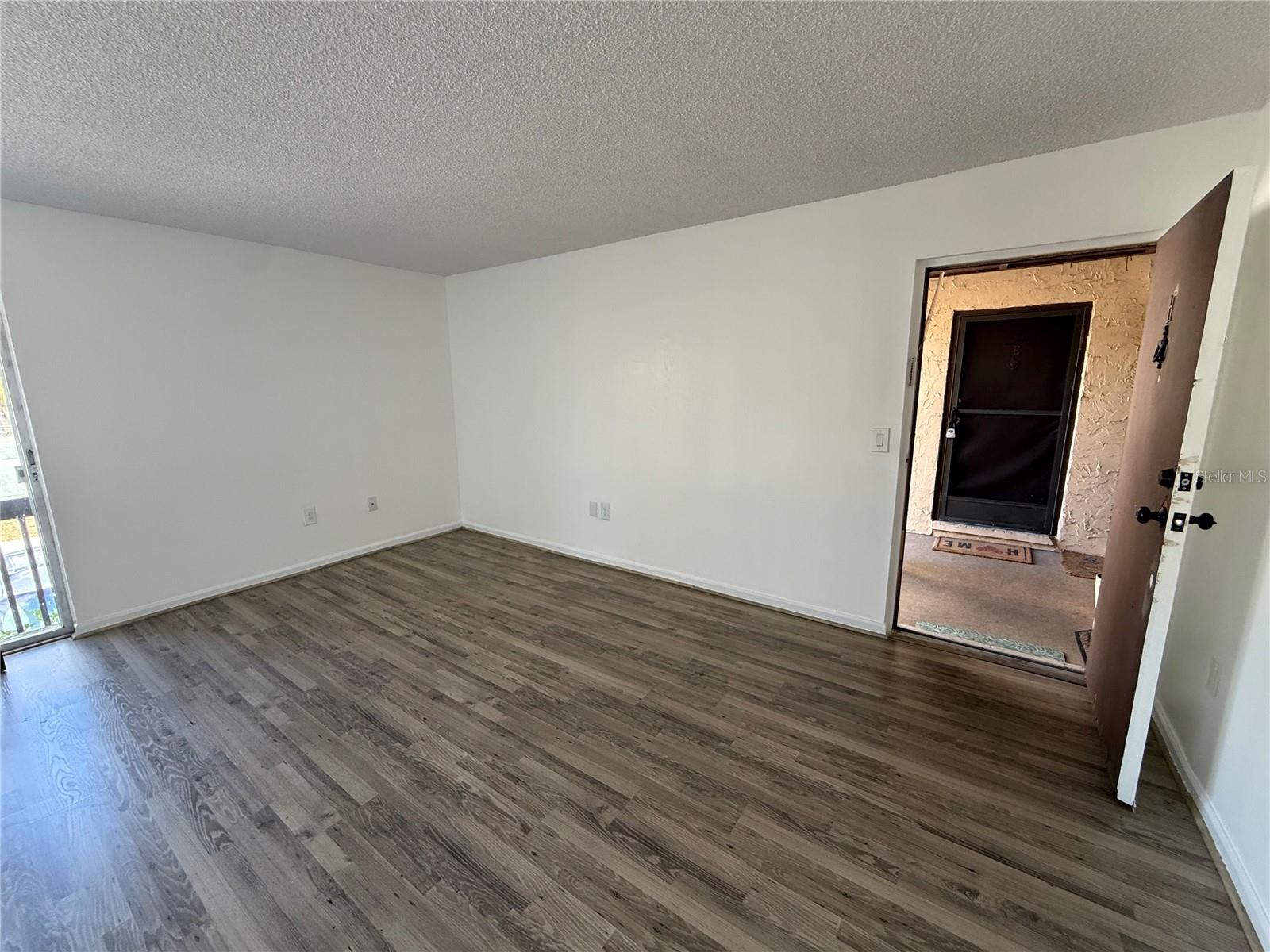New price and refreshed presentation on this clean, move-in-ready studio in Hidden Lake Village. This light, efficient floor plan offers low-maintenance living in a central Sarasota location just minutes to downtown, beaches, and shopping. The open layout, screened lanai, and peaceful courtyard setting make this an easy property to enjoy or add to your rental portfolio. Investors will appreciate the steady rental demand, low carrying costs, and community amenities including two pools, tennis courts, fitness center, clubhouse, and on-site laundry. With updated flooring, solid surface counters, and assigned parking, this is one of the most affordable opportunities in Sarasota with long-term upside. A great option for a first home, seasonal retreat, or income property.